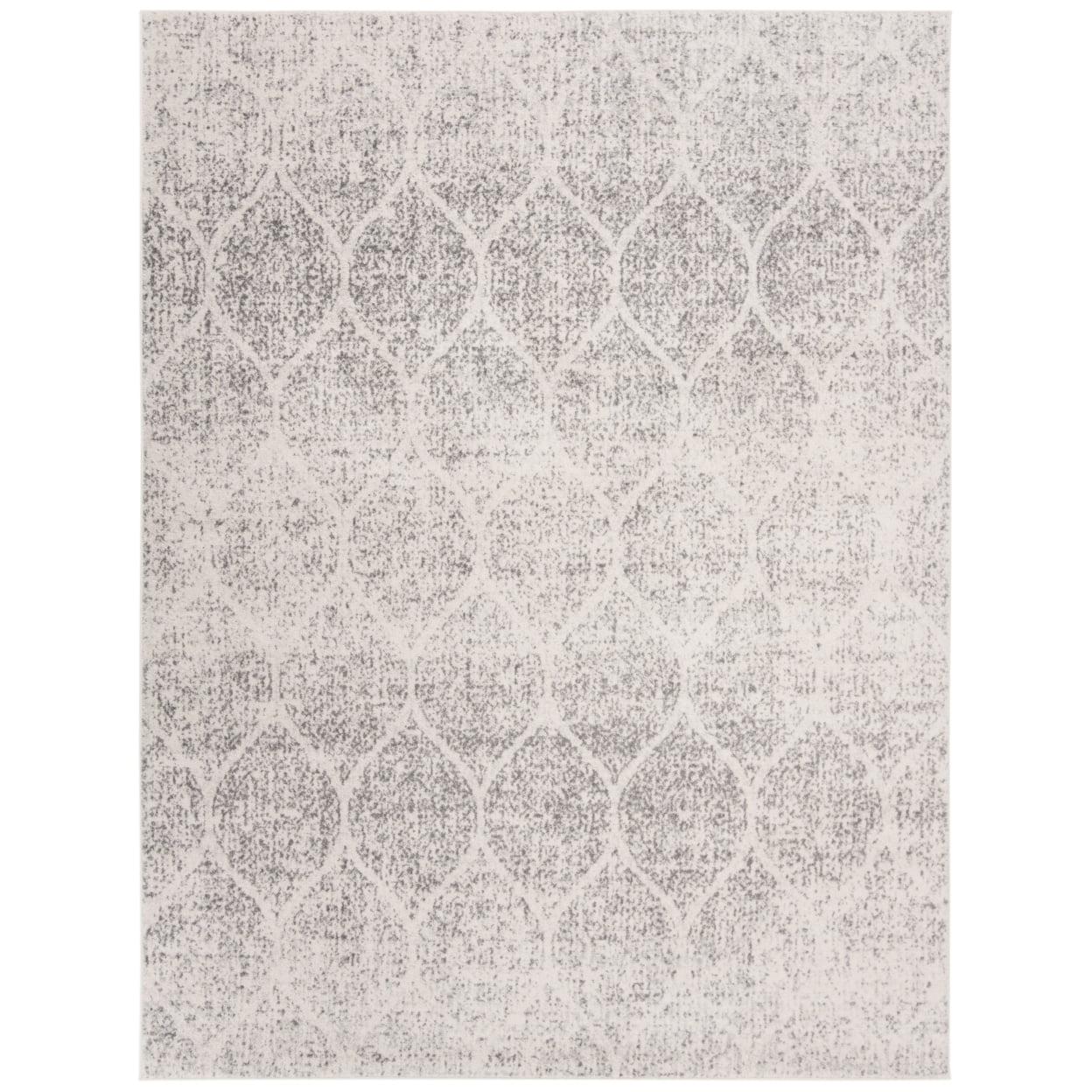 Ivory and Silver Geometric 8' x 10' Synthetic Area Rug