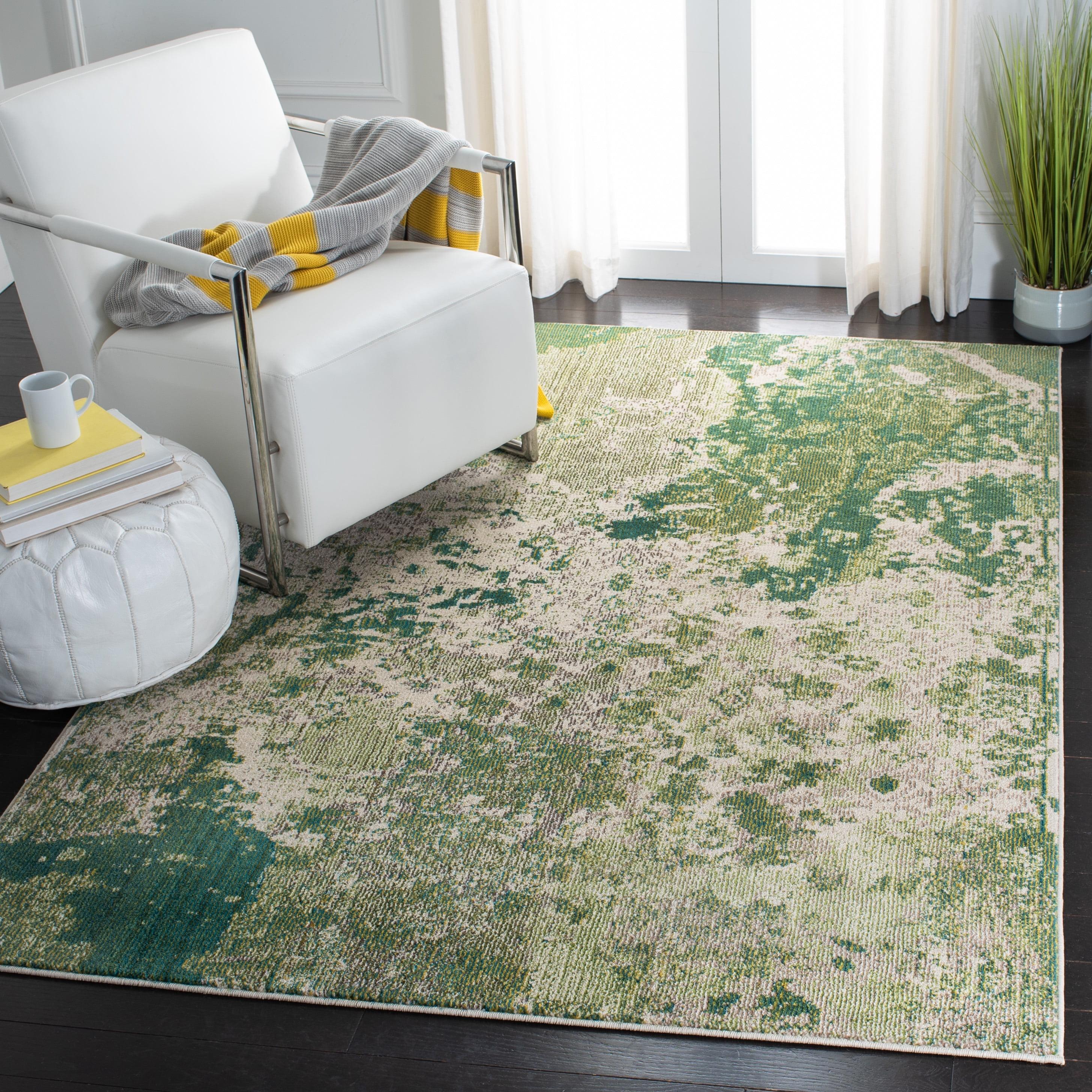 Ivory and Green Abstract 6' x 9' Synthetic Area Rug