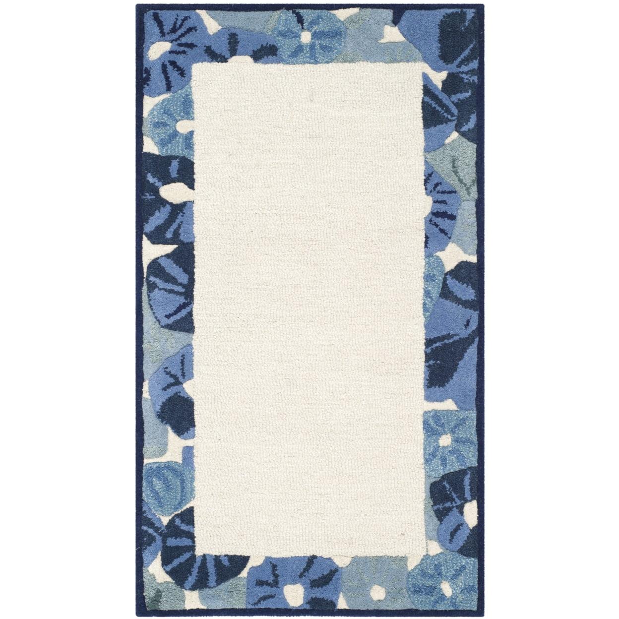 Azurite Blue Floral Border Hand-Tufted Wool Rug