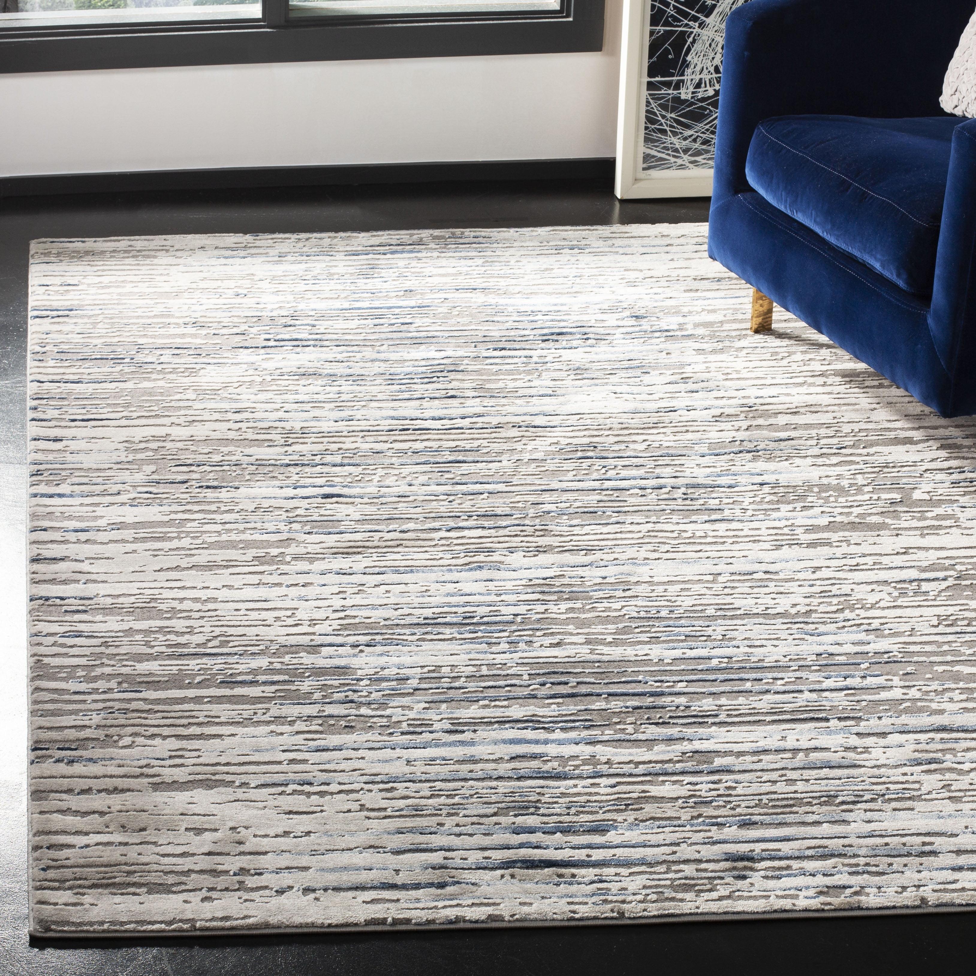 Grey and Light Grey Abstract 9' x 12' Synthetic Area Rug