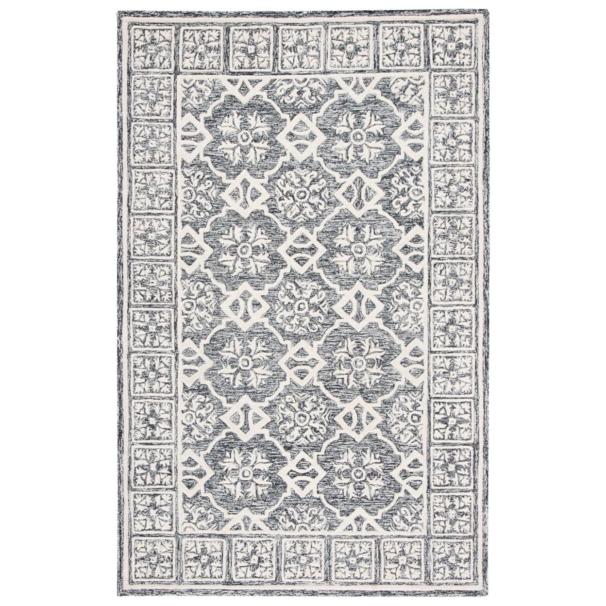 Metro MET851 Hand Tufted Indoor Area Rug - Black/Ivory - 5'x8' - Safavieh