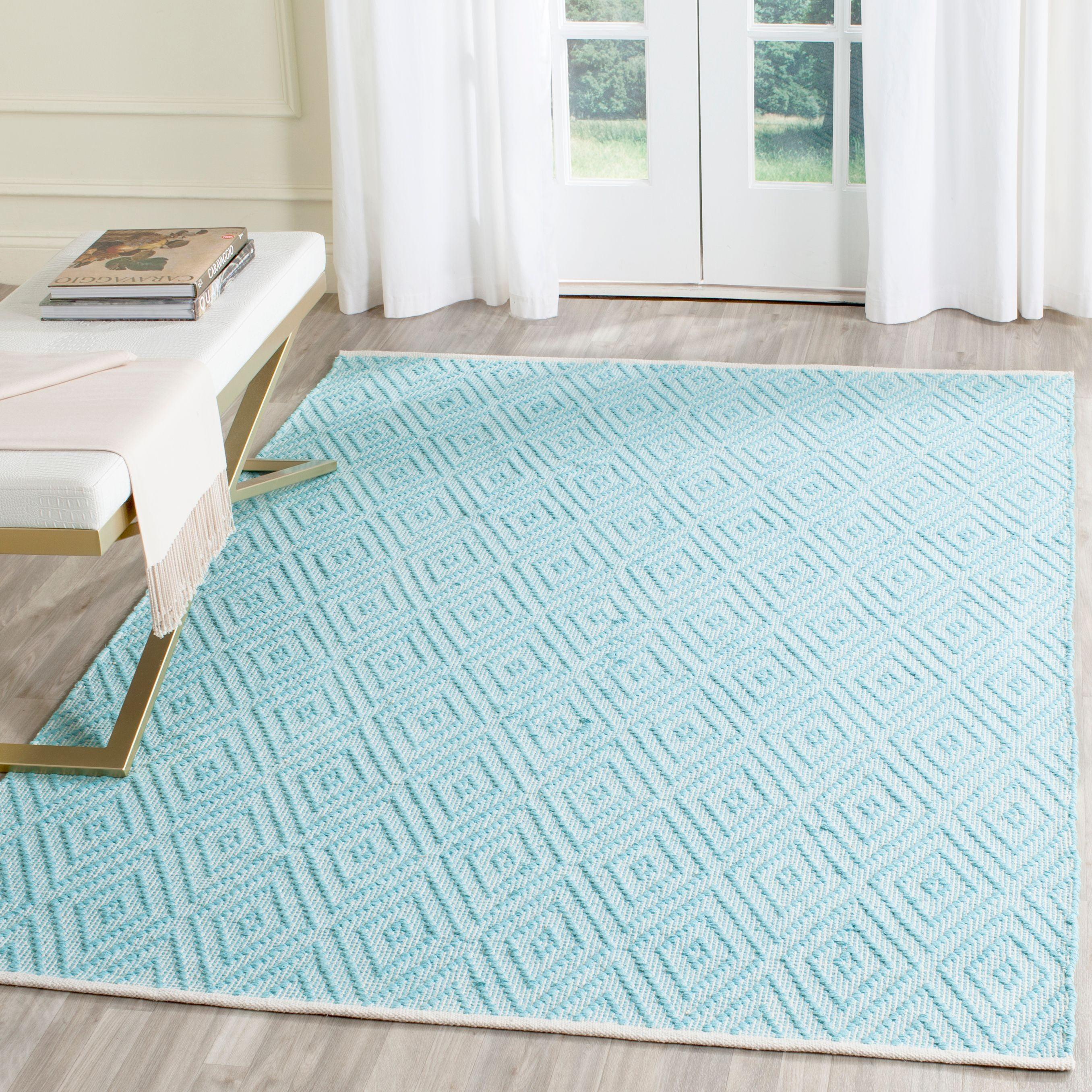 Turquoise and Ivory Geometric Cotton 4' x 6' Area Rug