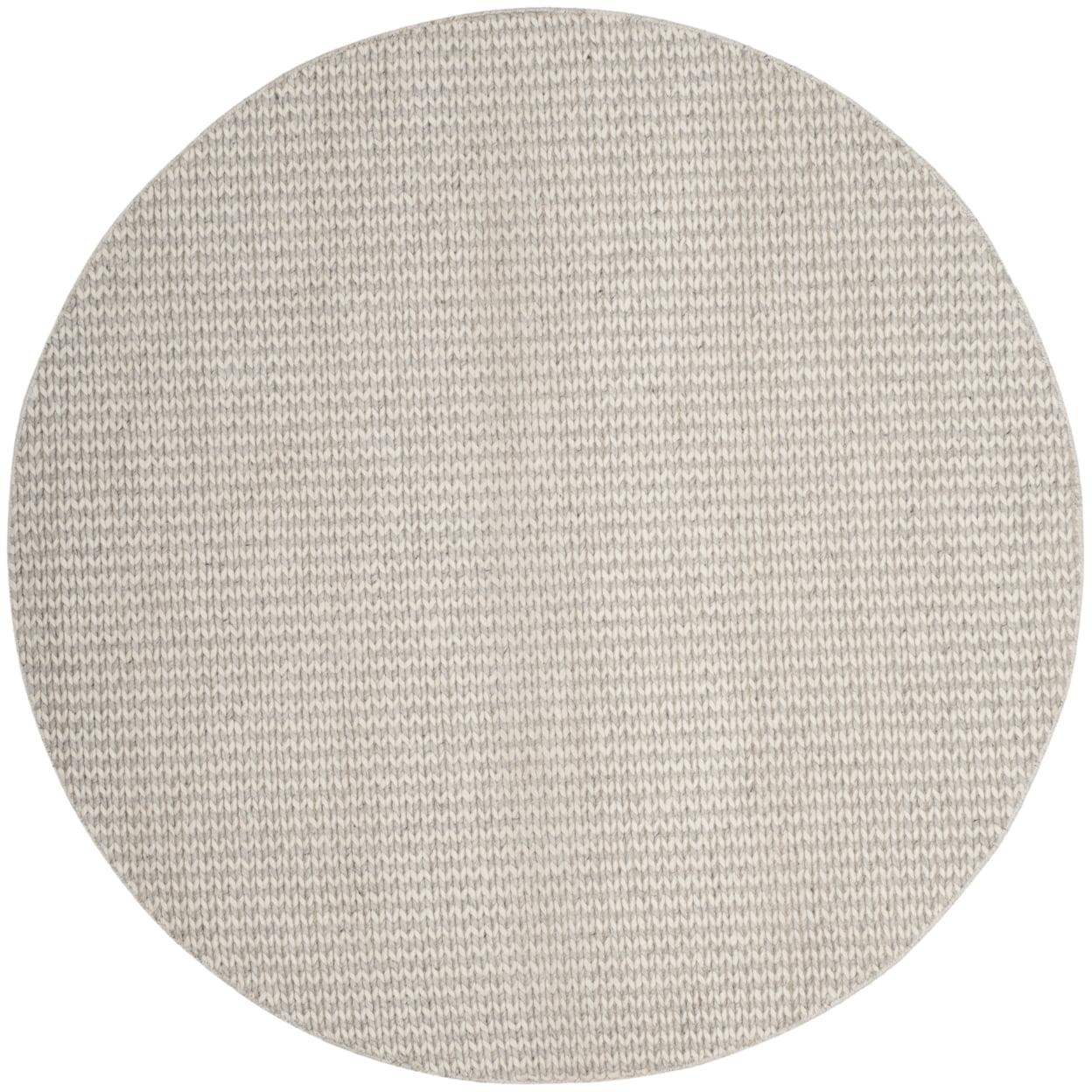 Hand-Tufted Ivory and Silver Round Wool Rug