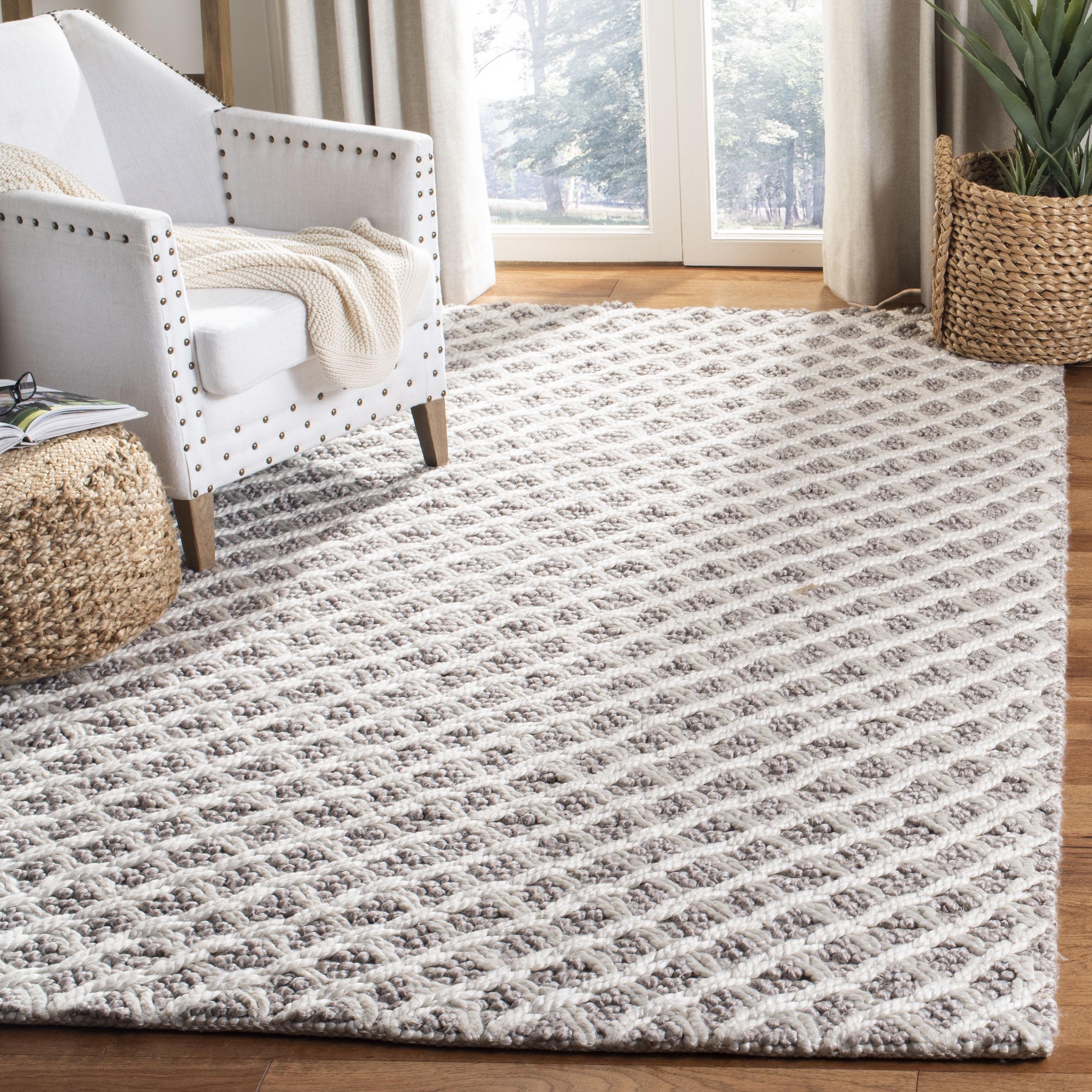 Ivory and Beige Braided Wool Area Rug, 5' x 8'