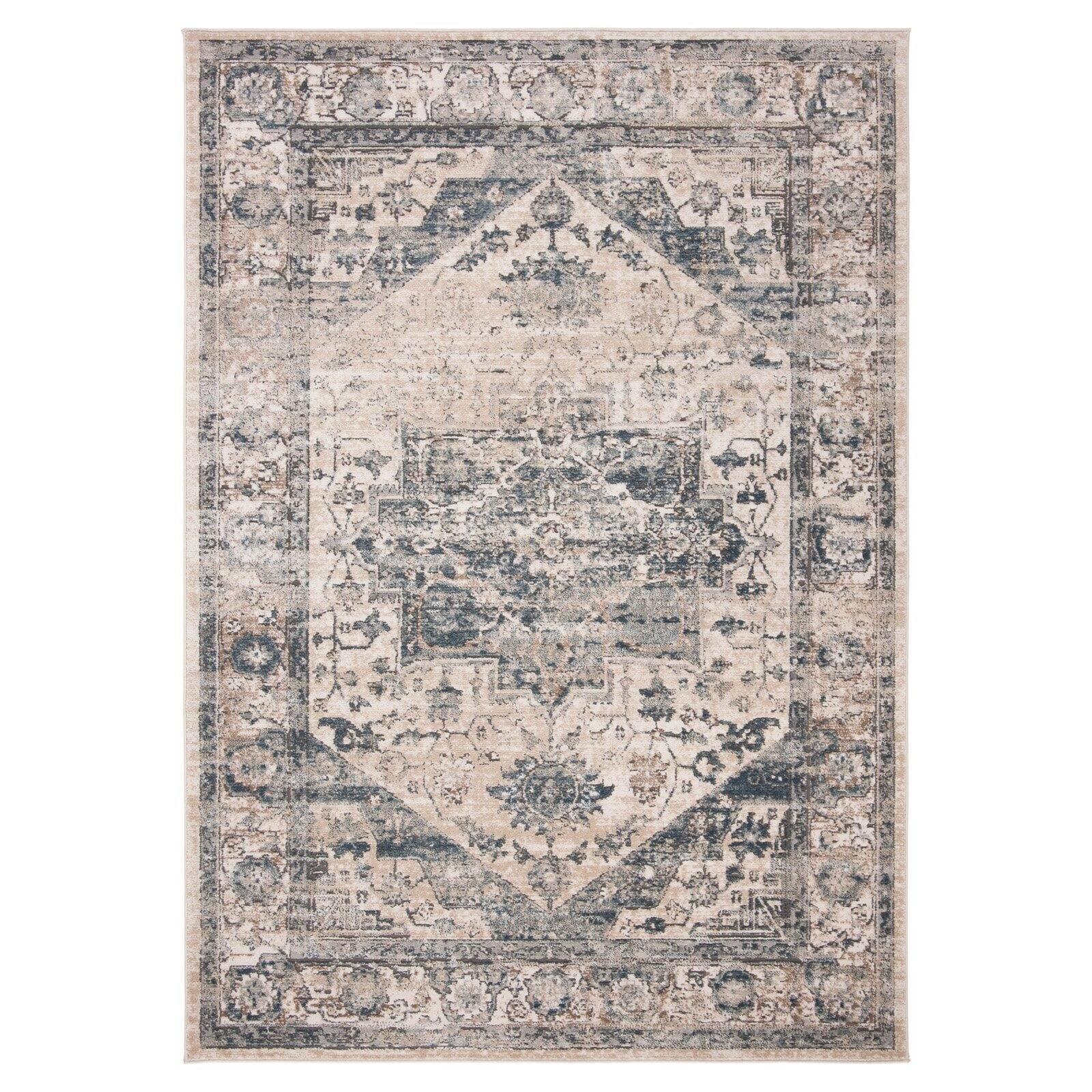 Ivory and Blue Floral Medallion 9' x 12' Synthetic Area Rug