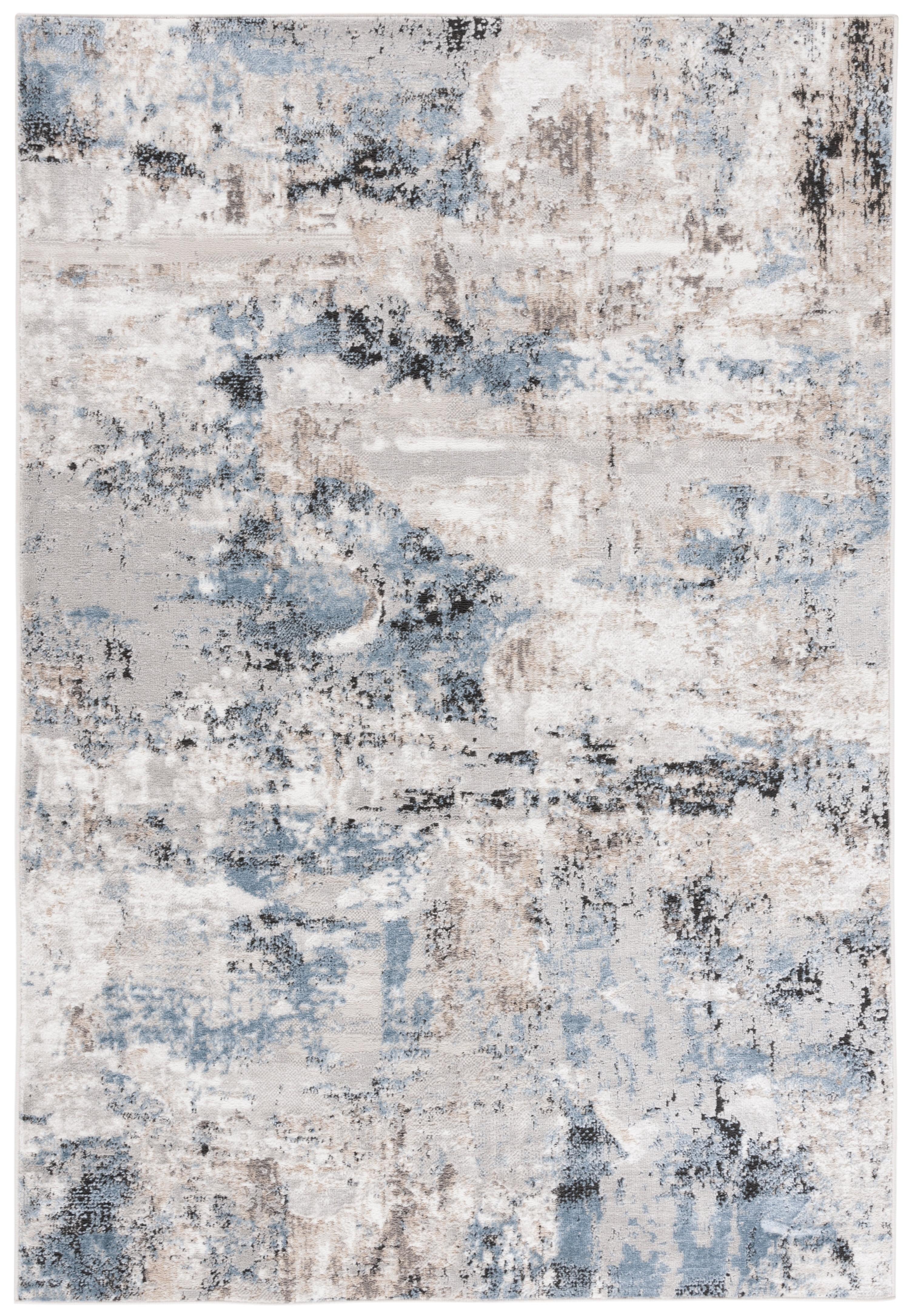 Ivory and Blue Abstract 8' x 10' Synthetic Area Rug