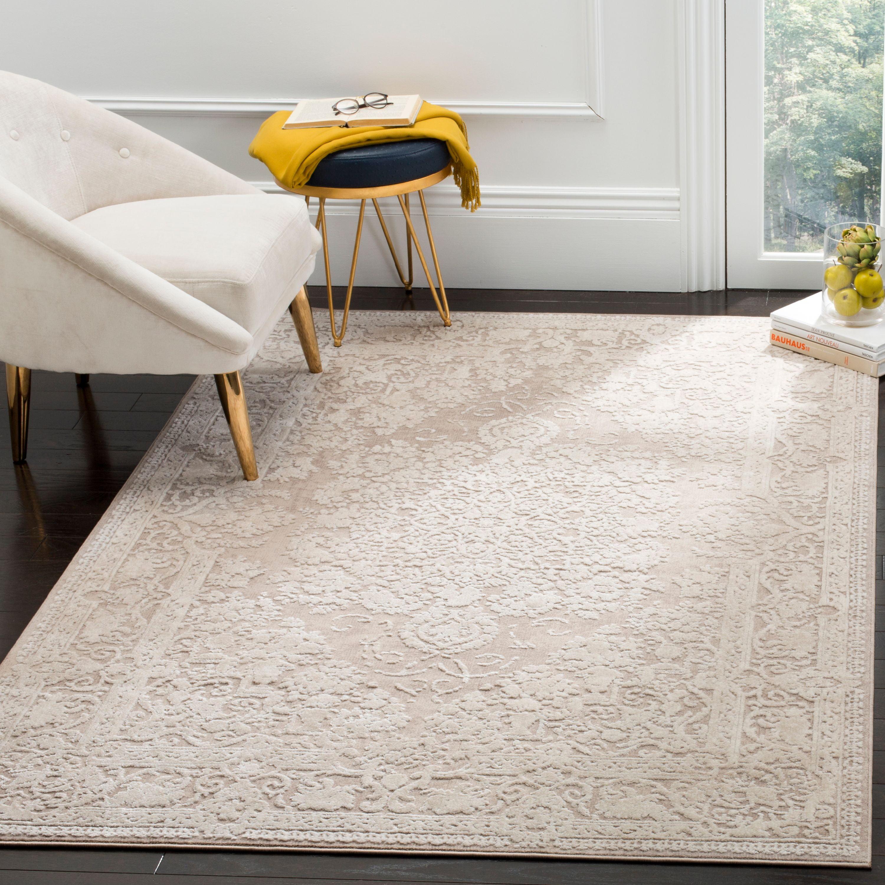 Beige and Cream Floral 10' x 14' Synthetic Area Rug