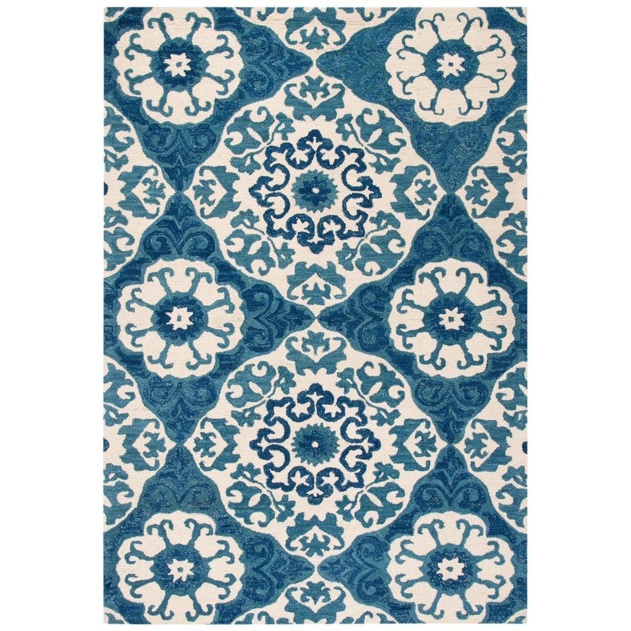 Handmade Blue and Ivory Wool Tufted 6' x 9' Rug