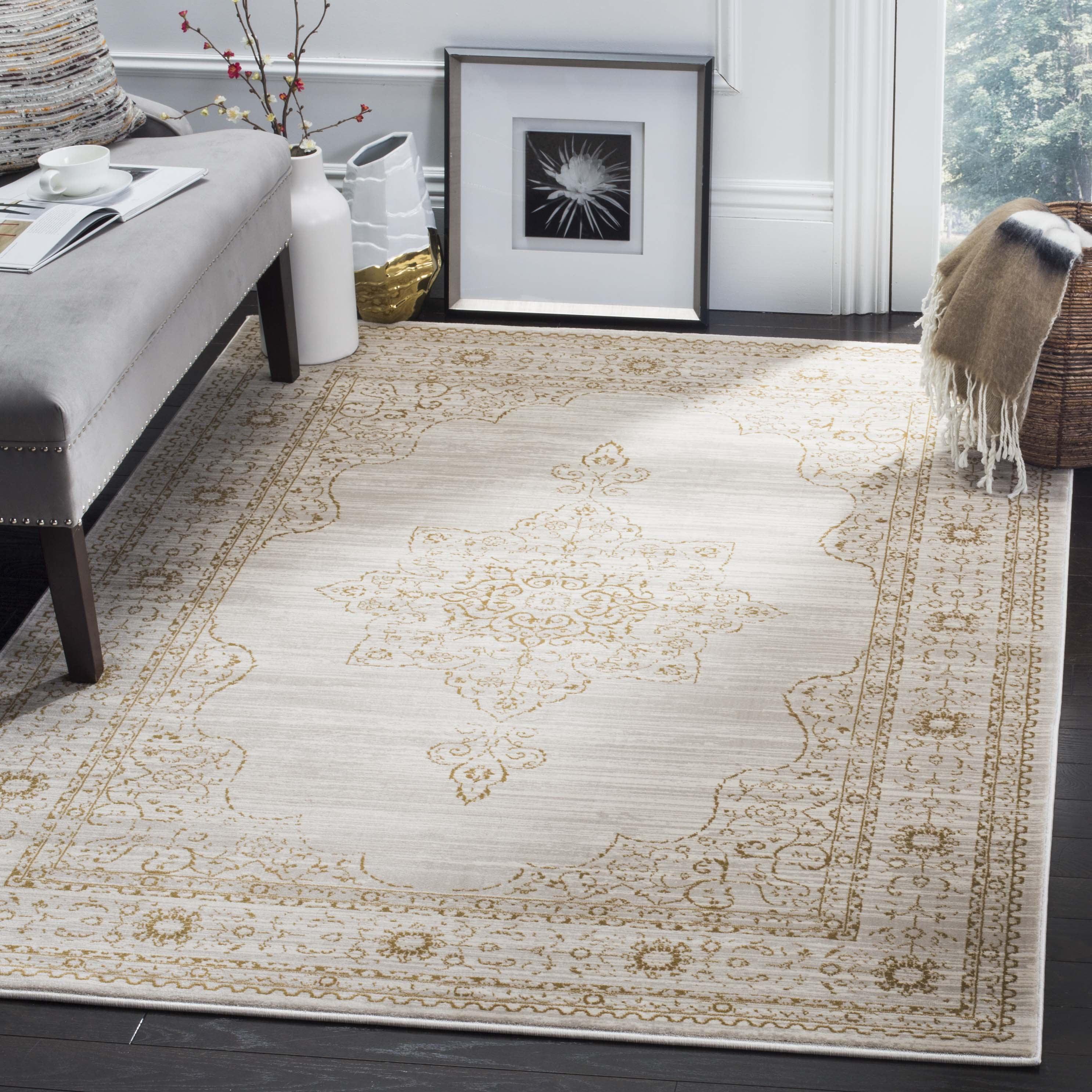 Elegant Cream and Gold Viscose 5'1" x 7'6" Traditional Area Rug