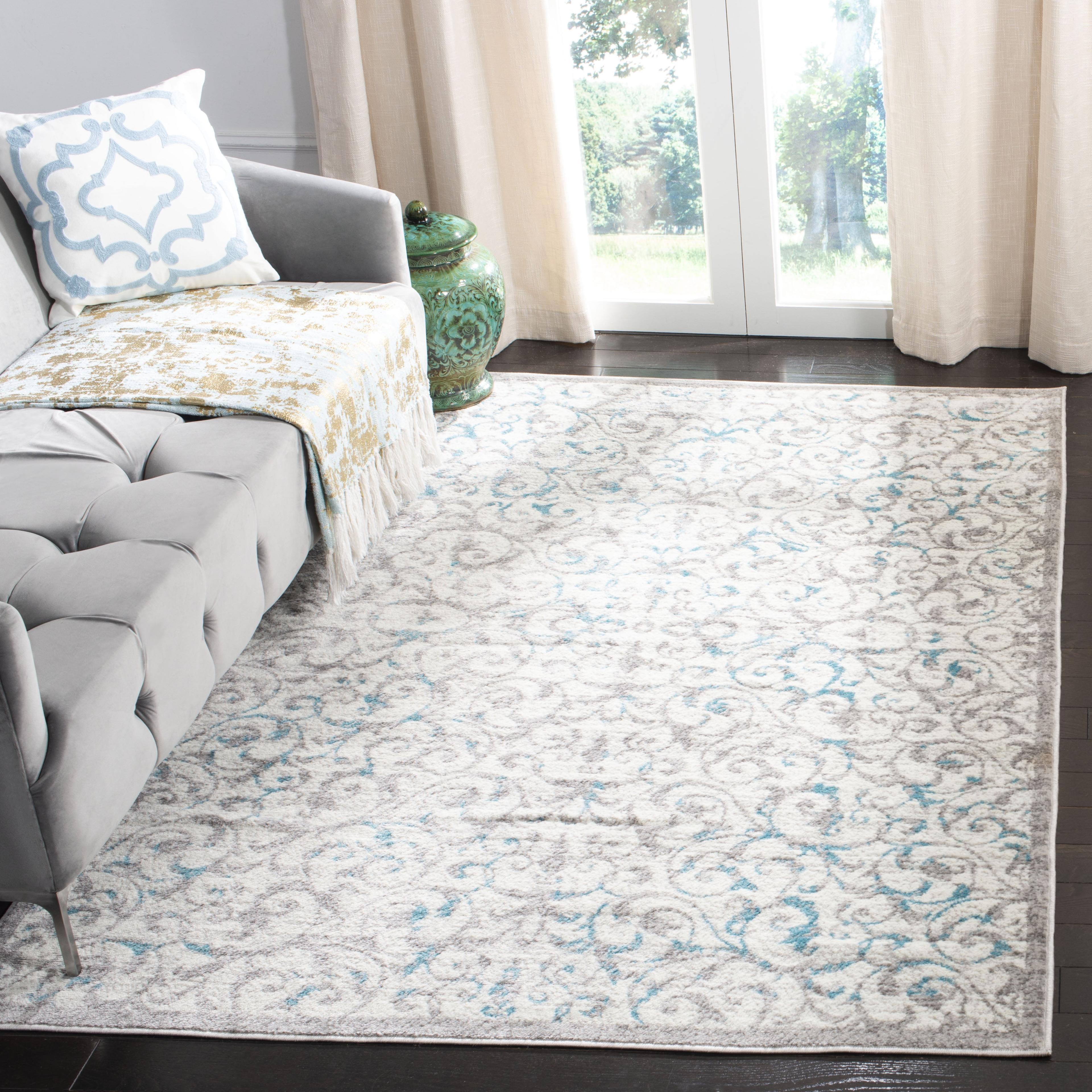 Ivory and Blue Floral 8' x 10' Synthetic Area Rug