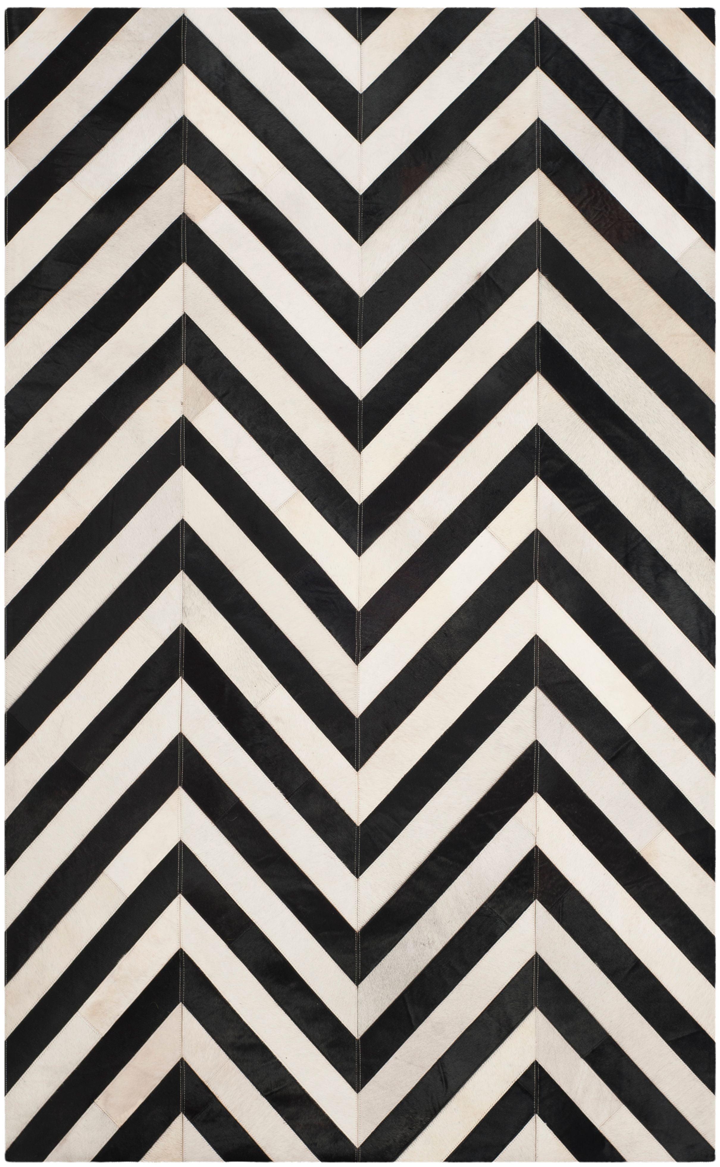 Hand-Knotted Geometric Black and White Cowhide Area Rug 5' x 8'