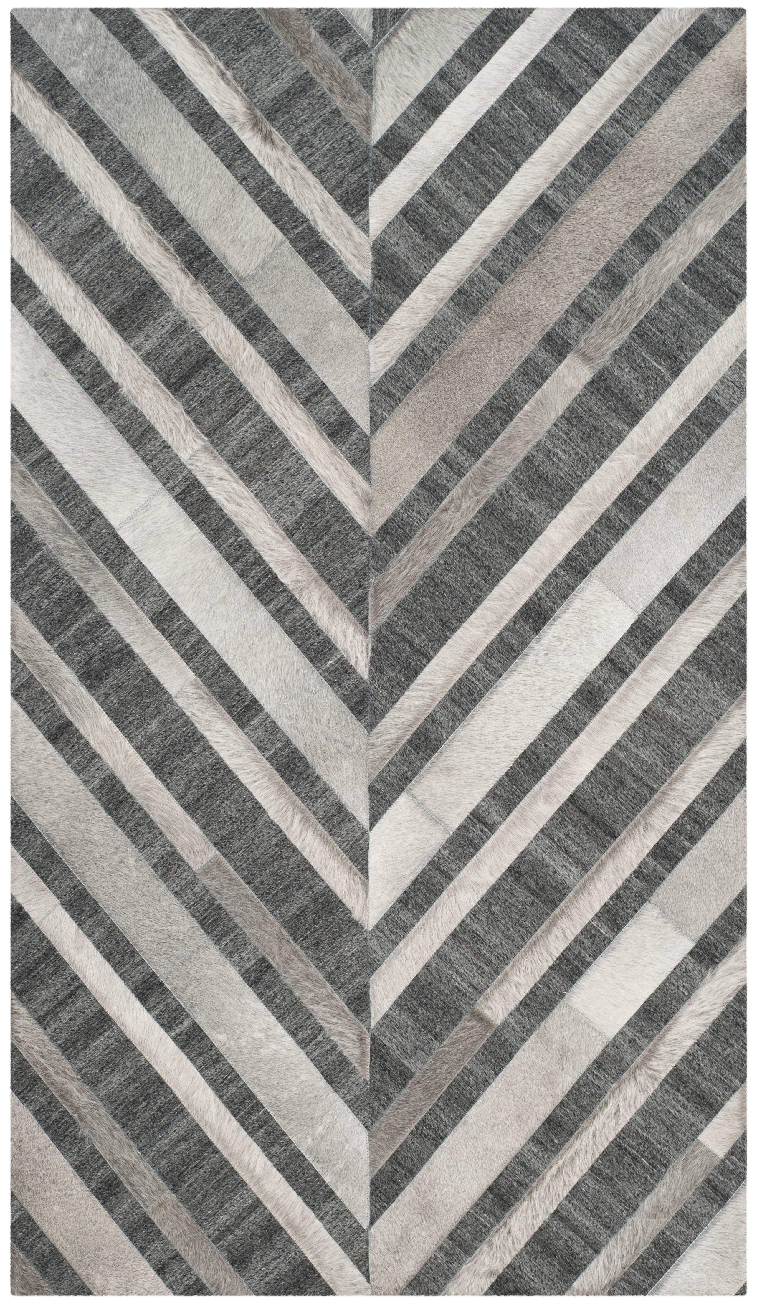 Ivory and Dark Grey Handmade Geometric Cowhide Area Rug