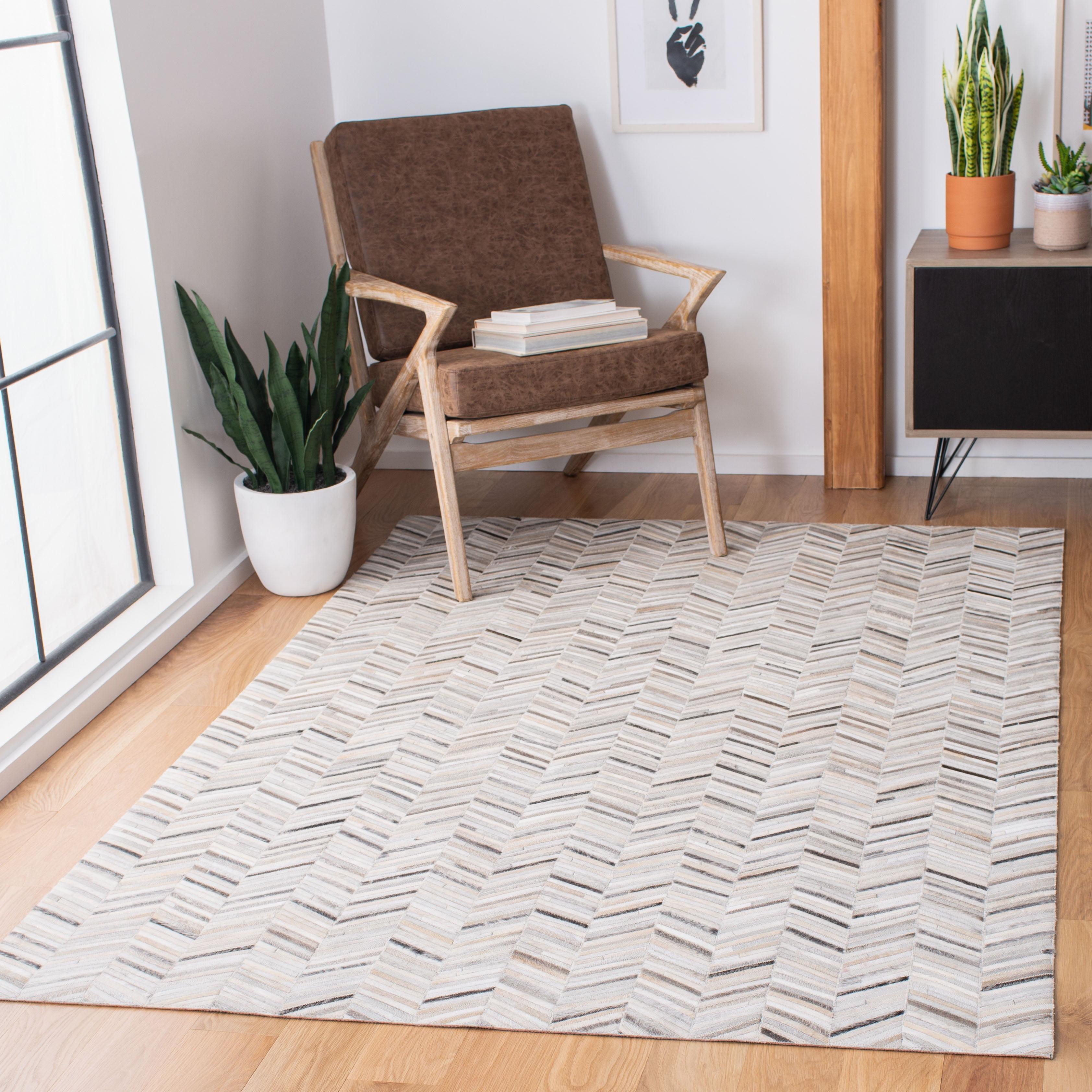 Handmade Ivory Geometric Cowhide Area Rug