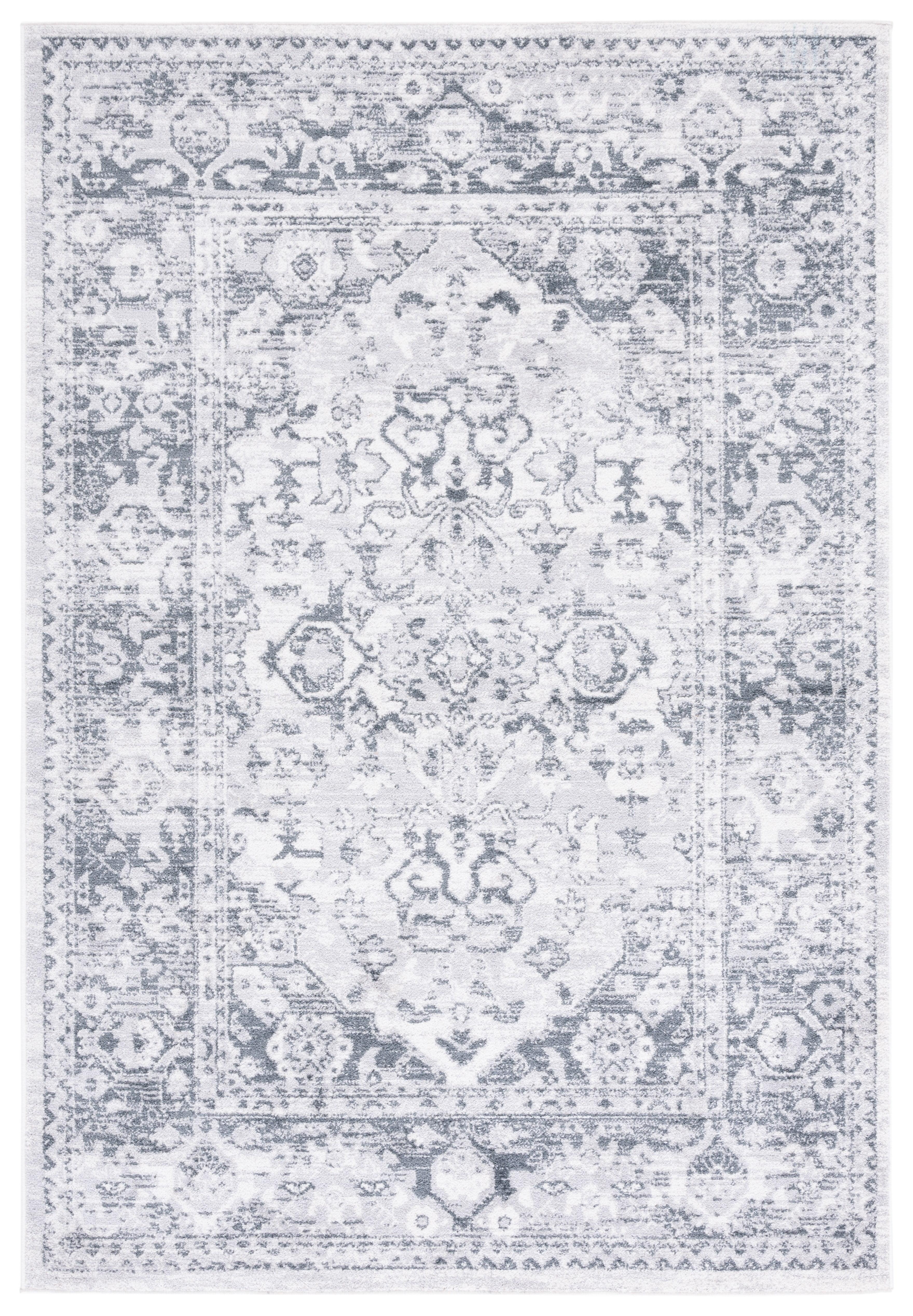 Ivory and Grey Abstract Synthetic 4' x 6' Area Rug