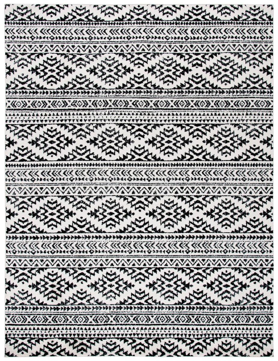 Ivory and Black Geometric Synthetic 9' x 12' Area Rug