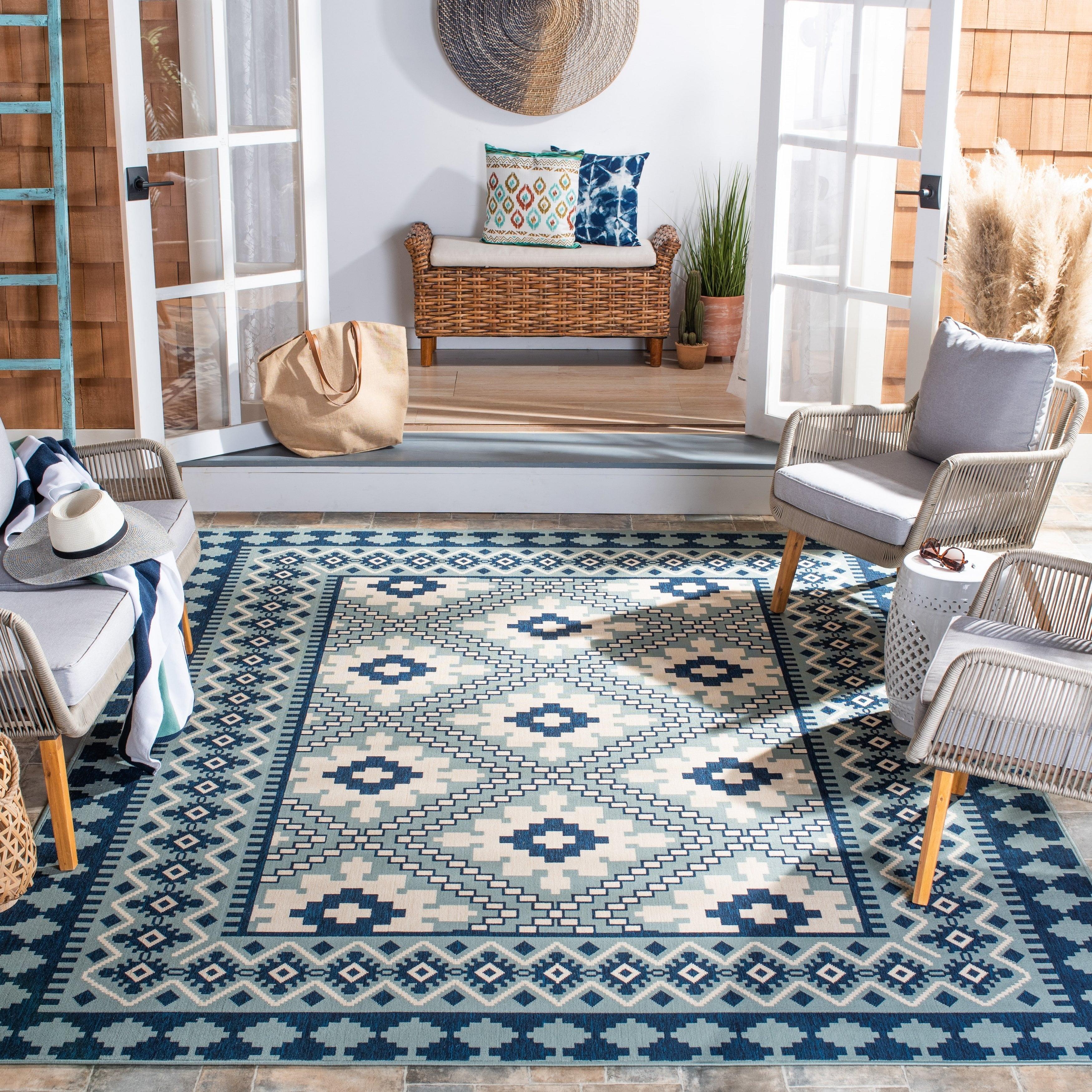 Blue and Ivory Synthetic Easy Care Indoor/Outdoor Rug