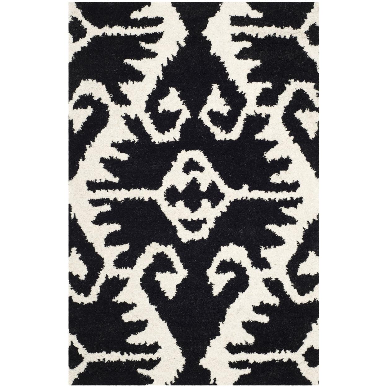 Handmade Black and Ivory Tufted Wool Area Rug