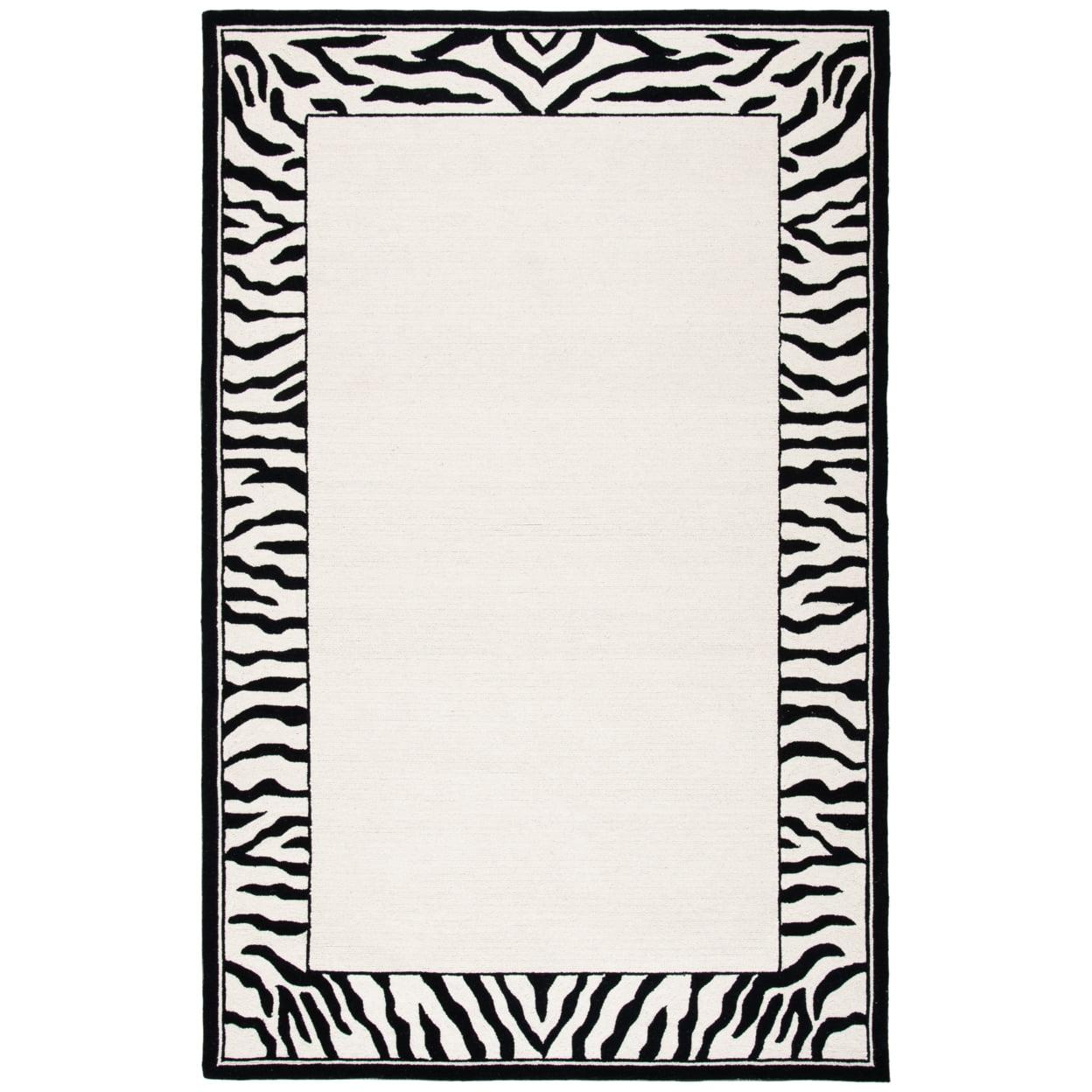 SAFAVIEH Chelsea Petrina Zebra Bordered Wool Area Rug, White/Black, 3'9" x 5'9"