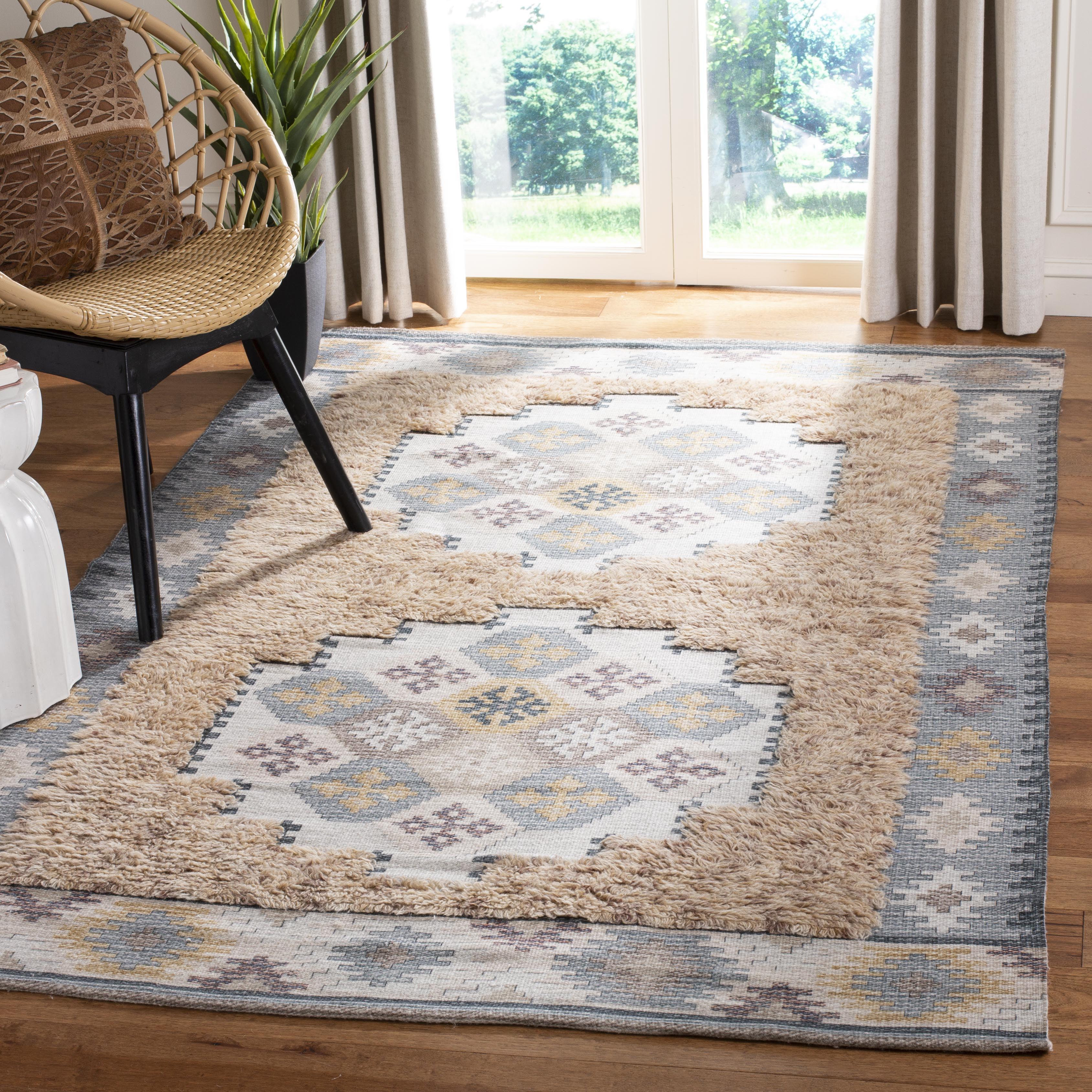 Ivory and Taupe Hand Loomed Wool Area Rug