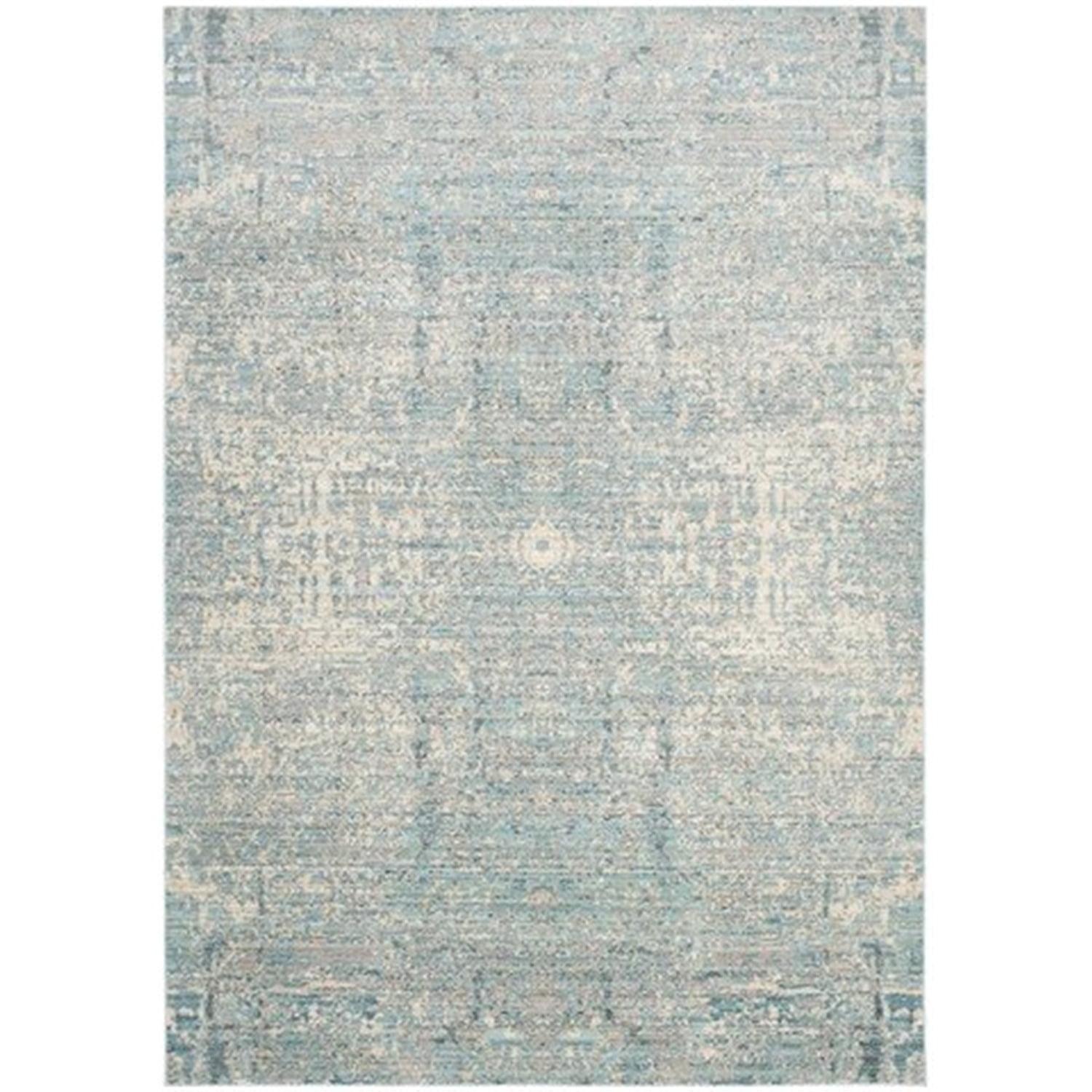 Teal and Multicolor Abstract Synthetic 4' x 6' Area Rug