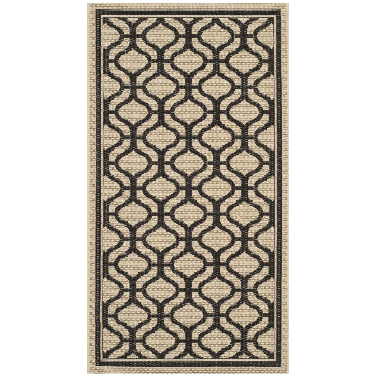 Cream and Black Geometric 8' x 10' Synthetic Rug