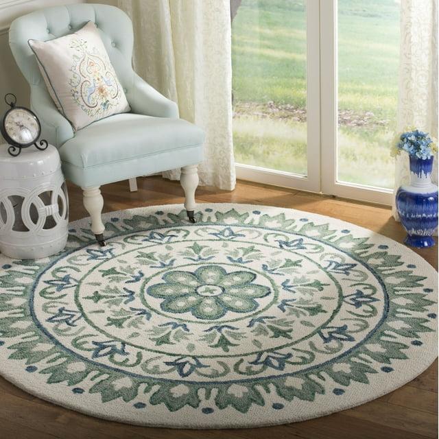 Novelty NOV607 Hand Tufted Area Rug - Ivory/Teal - 4' round - Safavieh.