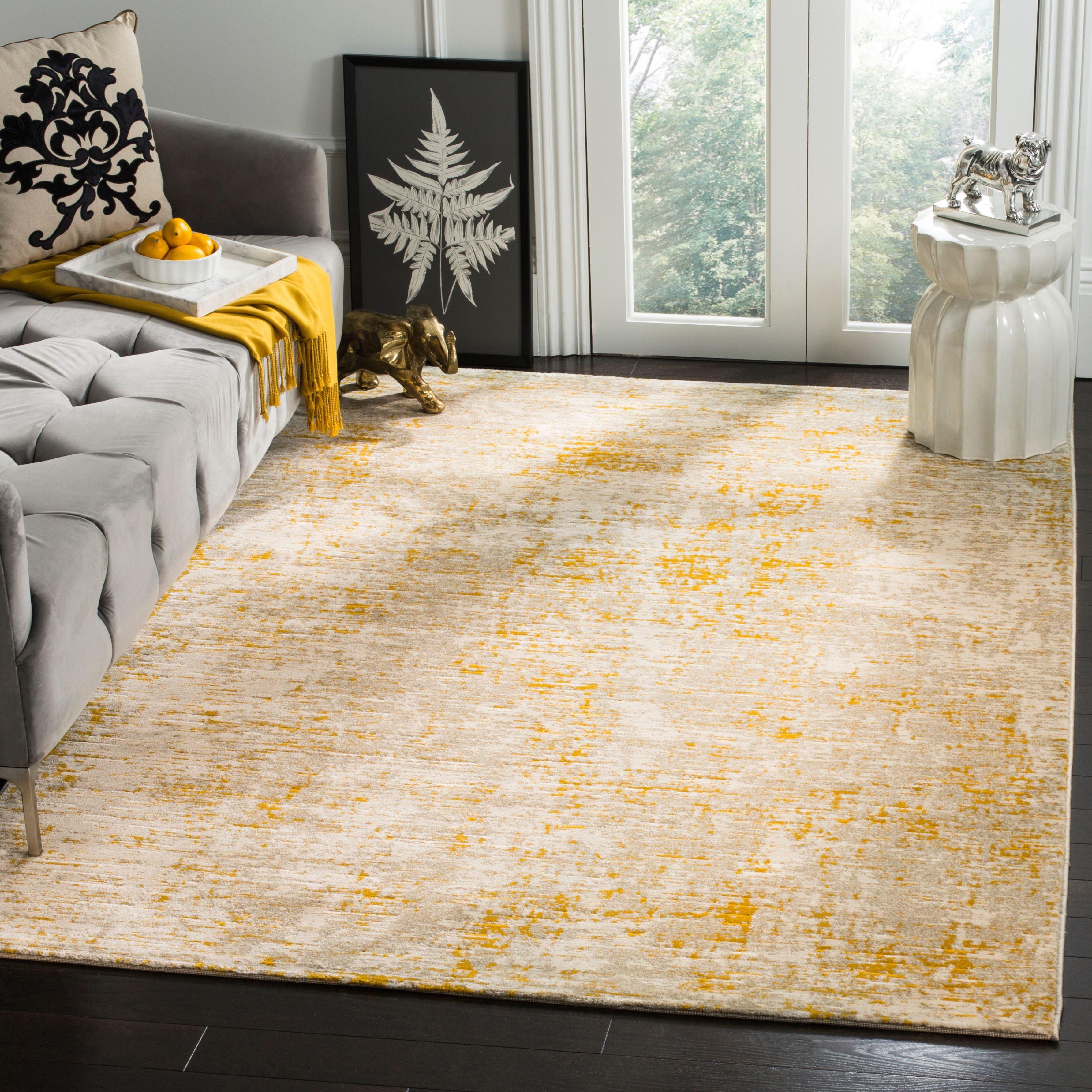 6' x 9' Gray and Yellow Abstract Synthetic Area Rug