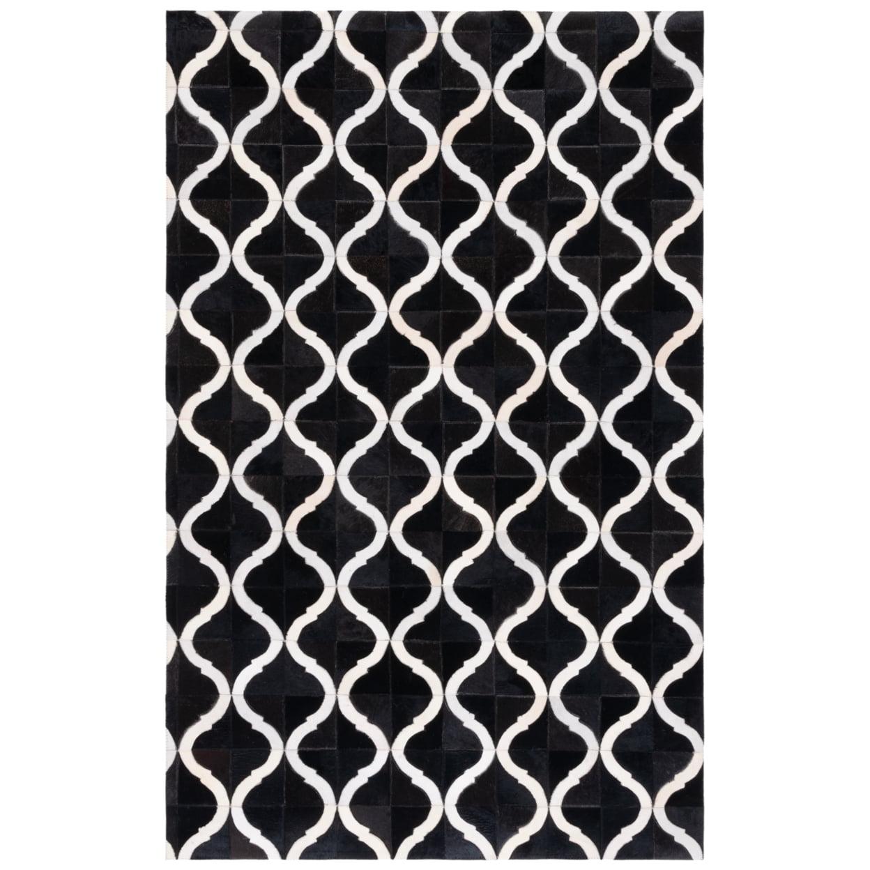 Handmade Black and Beige Geometric Cowhide Area Rug