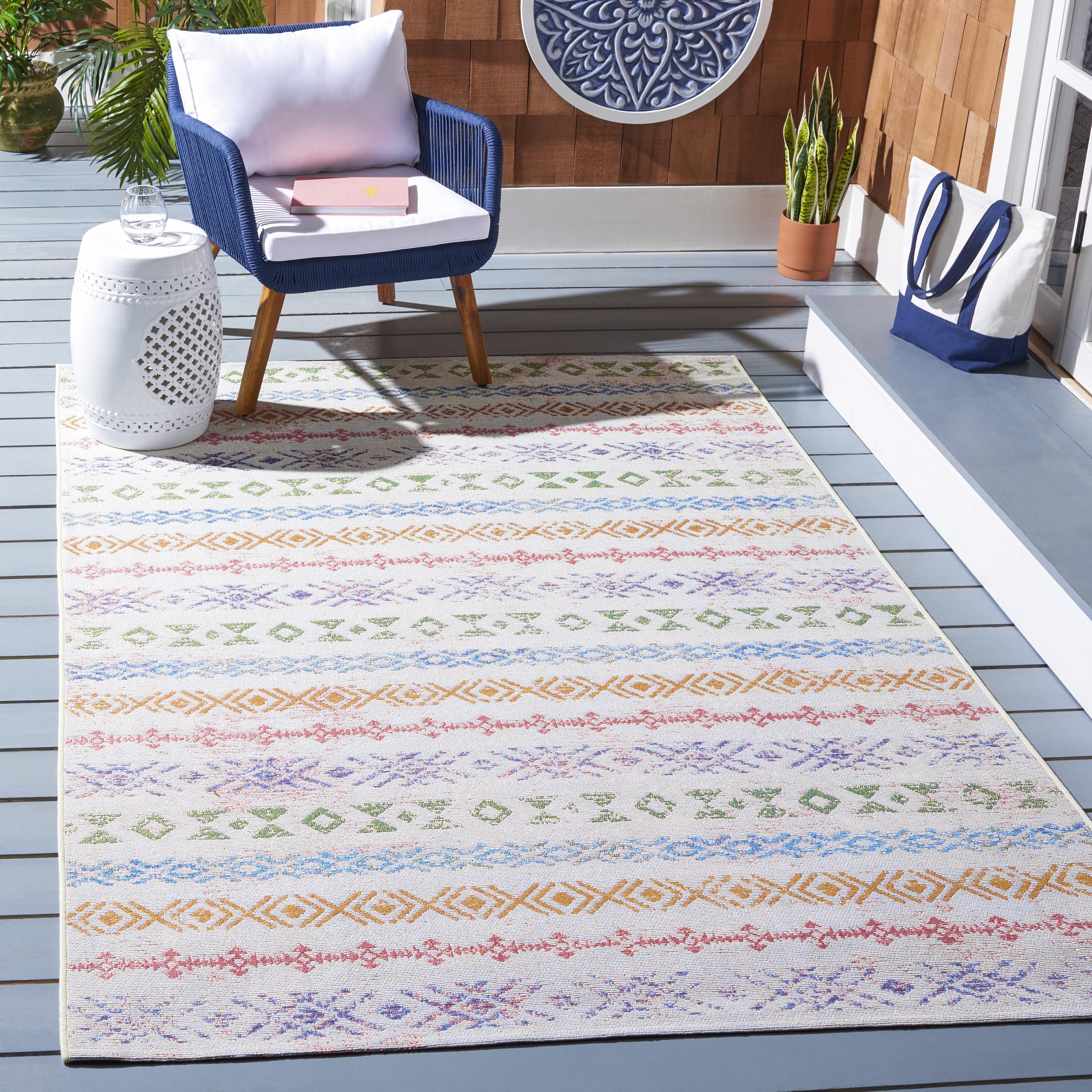 Ivory and Blue 4' x 6' Stain-Resistant Synthetic Area Rug