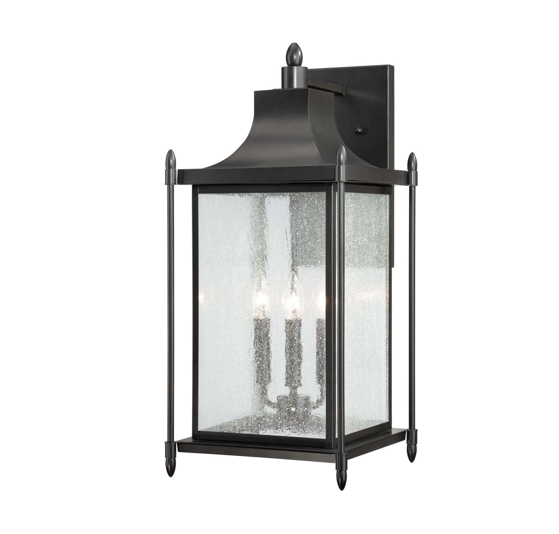 Black Transitional Outdoor Lantern Sconce with Clear Seeded Glass