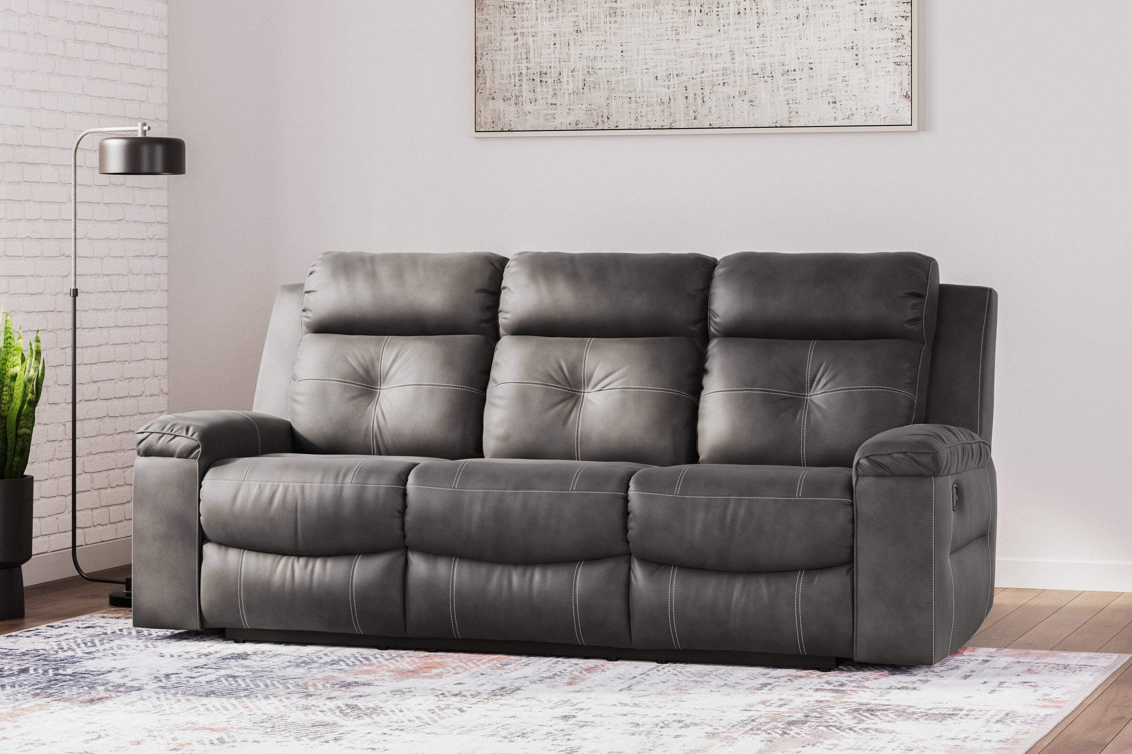 Signature Design by Ashley Jesolo Reclining Sofa in Dark Gray