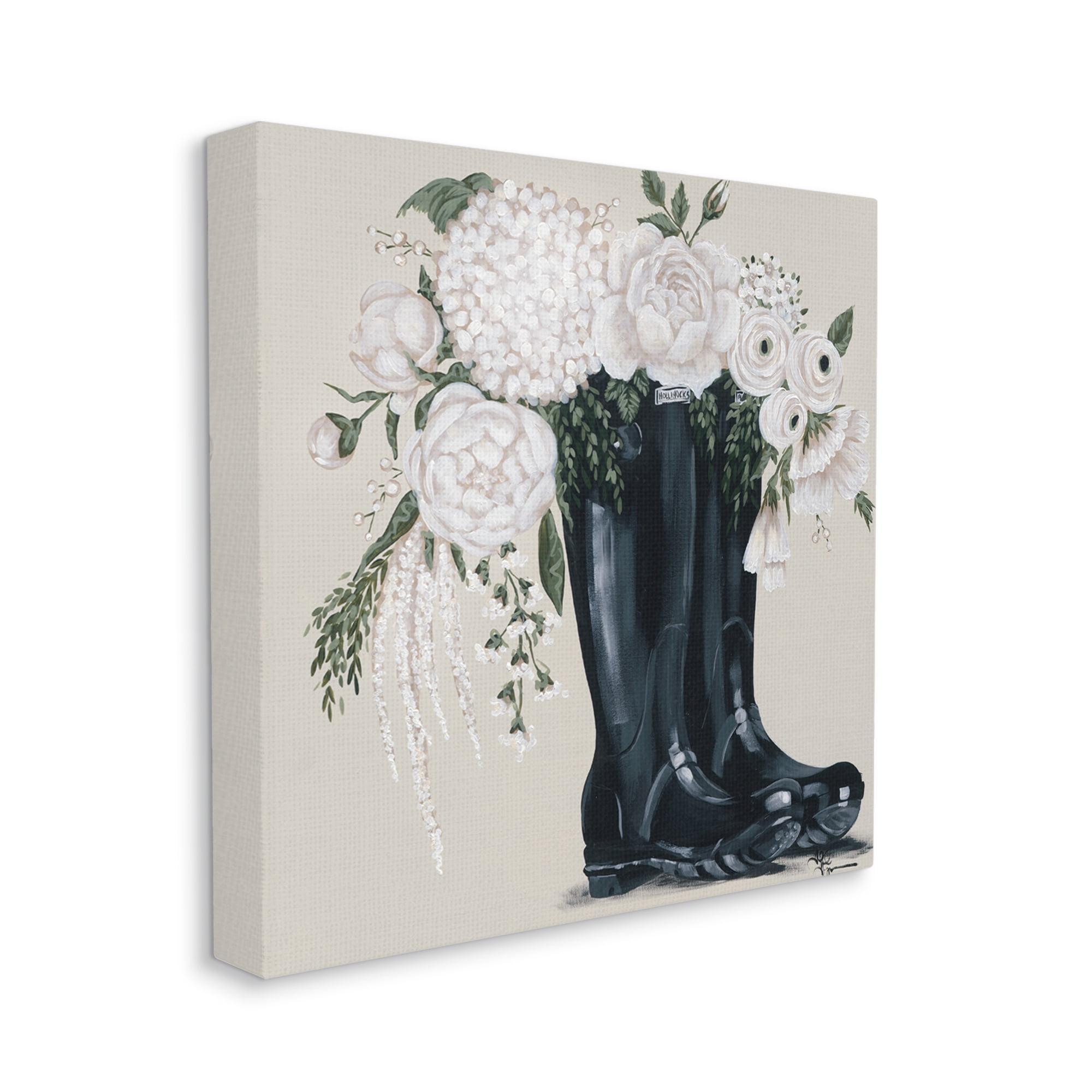 The Stupell Home Decor Collection White Flower Arrangement in Black Boots Painting Canvas Wall Art