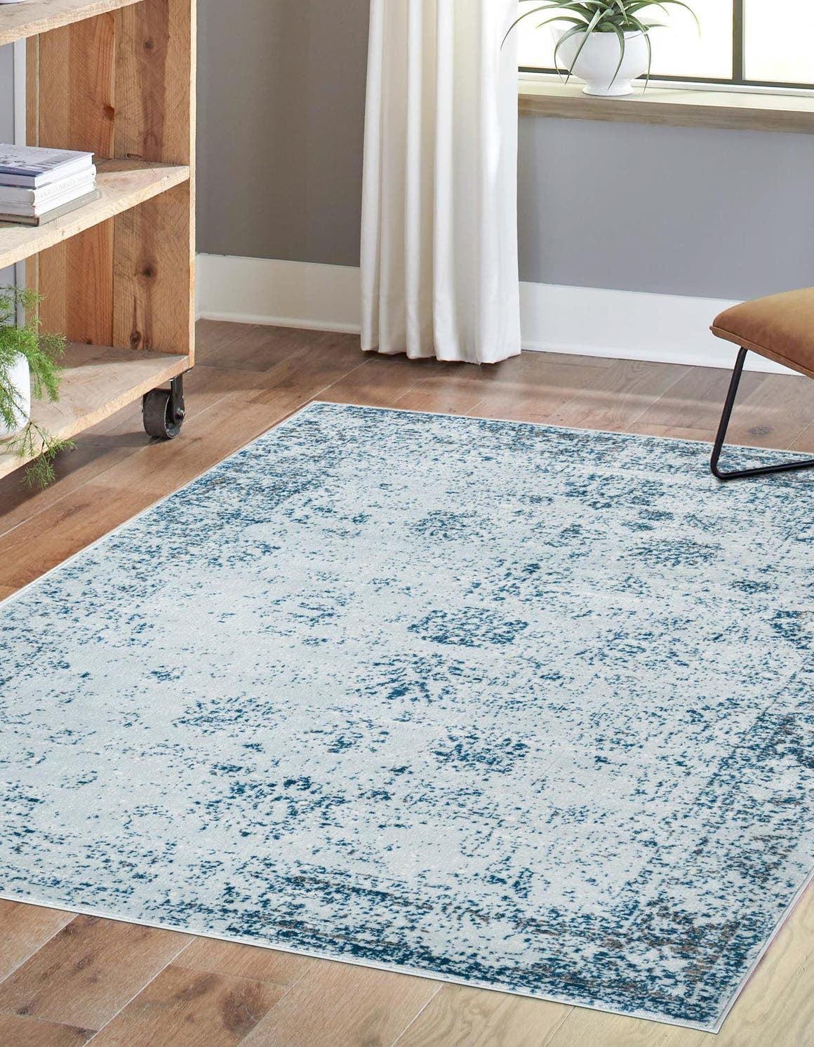 Reversible Handmade Light Blue Synthetic Indoor Rug