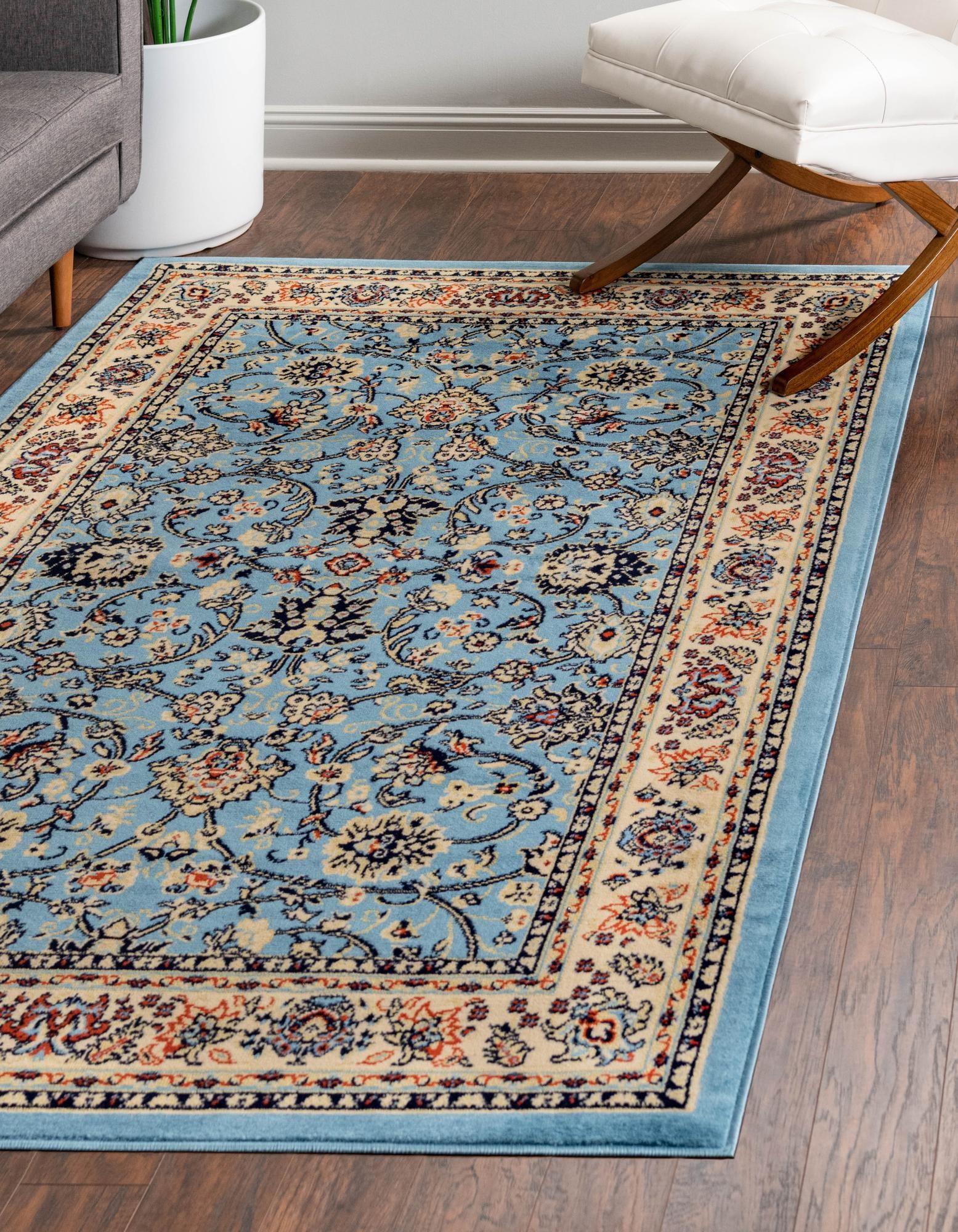 Light Blue and Ivory Synthetic 4' x 6' Reversible Area Rug