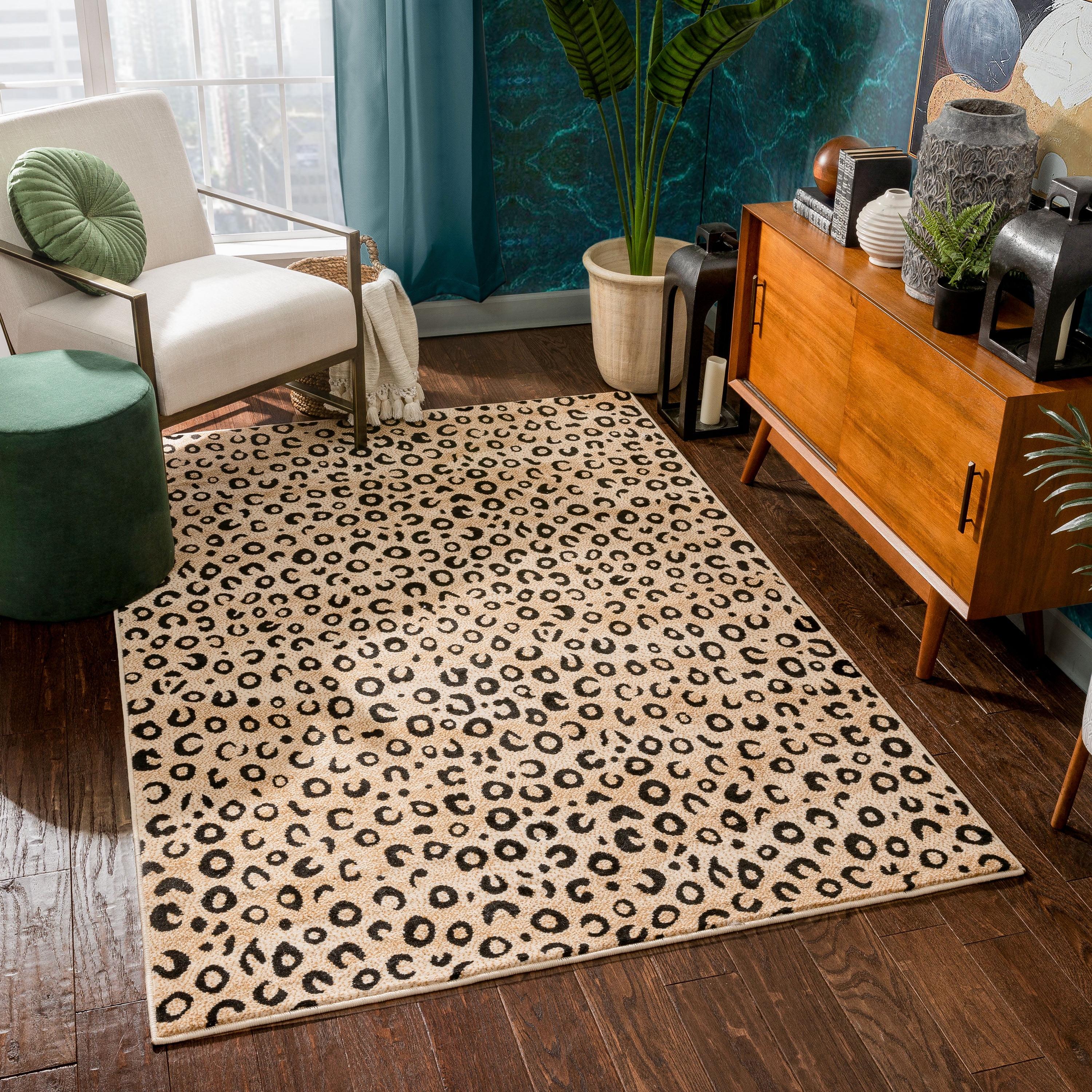 Dulcet Leopard Print Black and Beige Synthetic Area Rug 5' x 7'