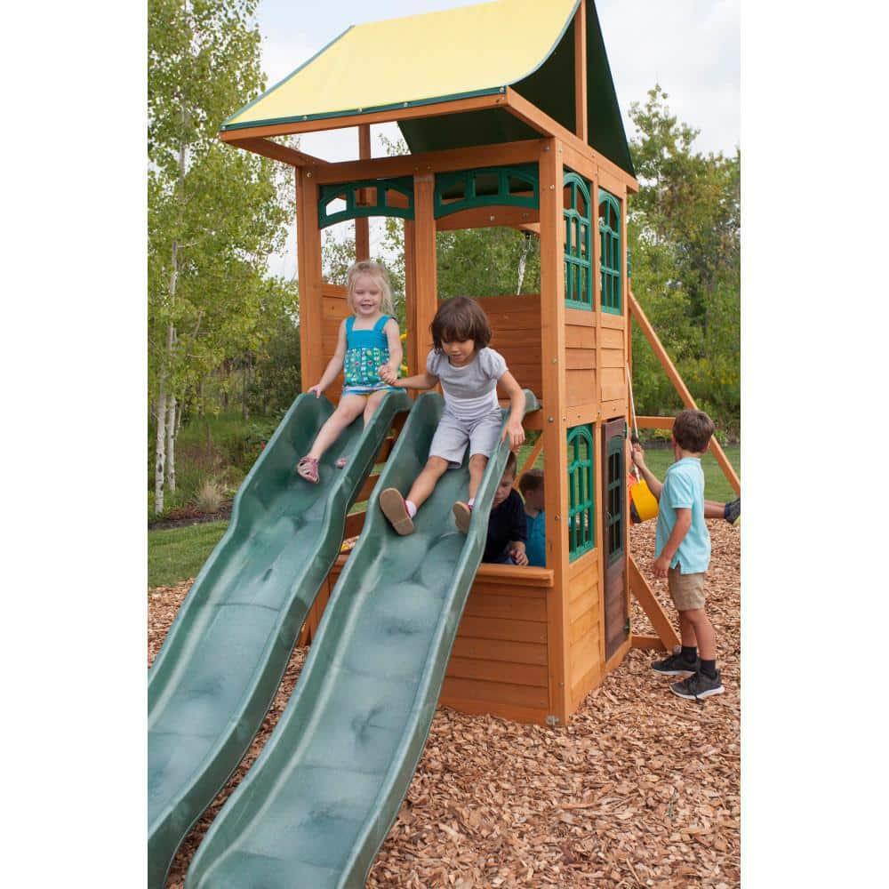 KidKraft Treasure Cove Wooden Swing Set with Slides and Rock Wall