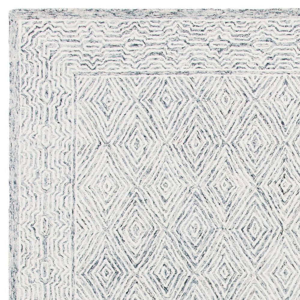 Capri CPR217 Hand Tufted Area Rug - Ivory/Blue - 8'x10' - Safavieh.