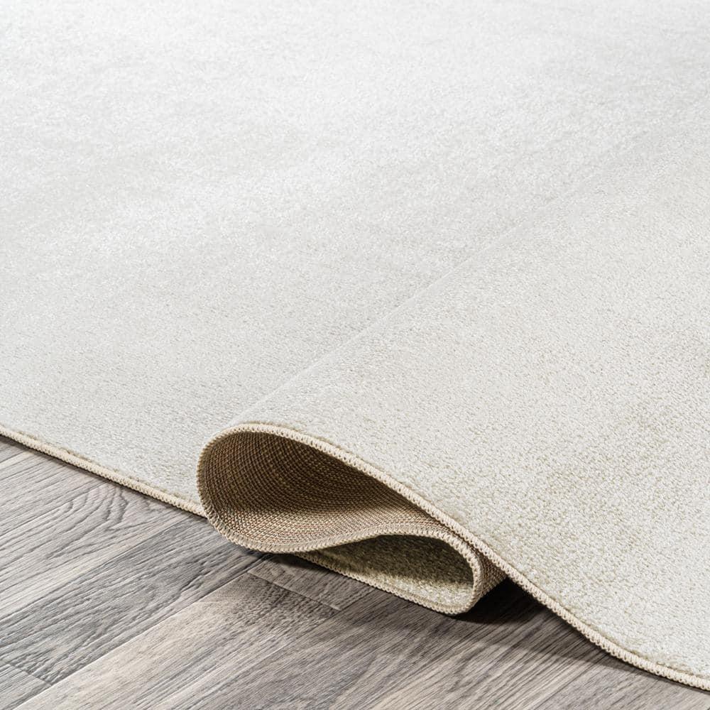 JONATHAN Y Twyla Classic Solid Low-Pile Machine-Washable Cream 4 ft. x 6 ft. Area Rug