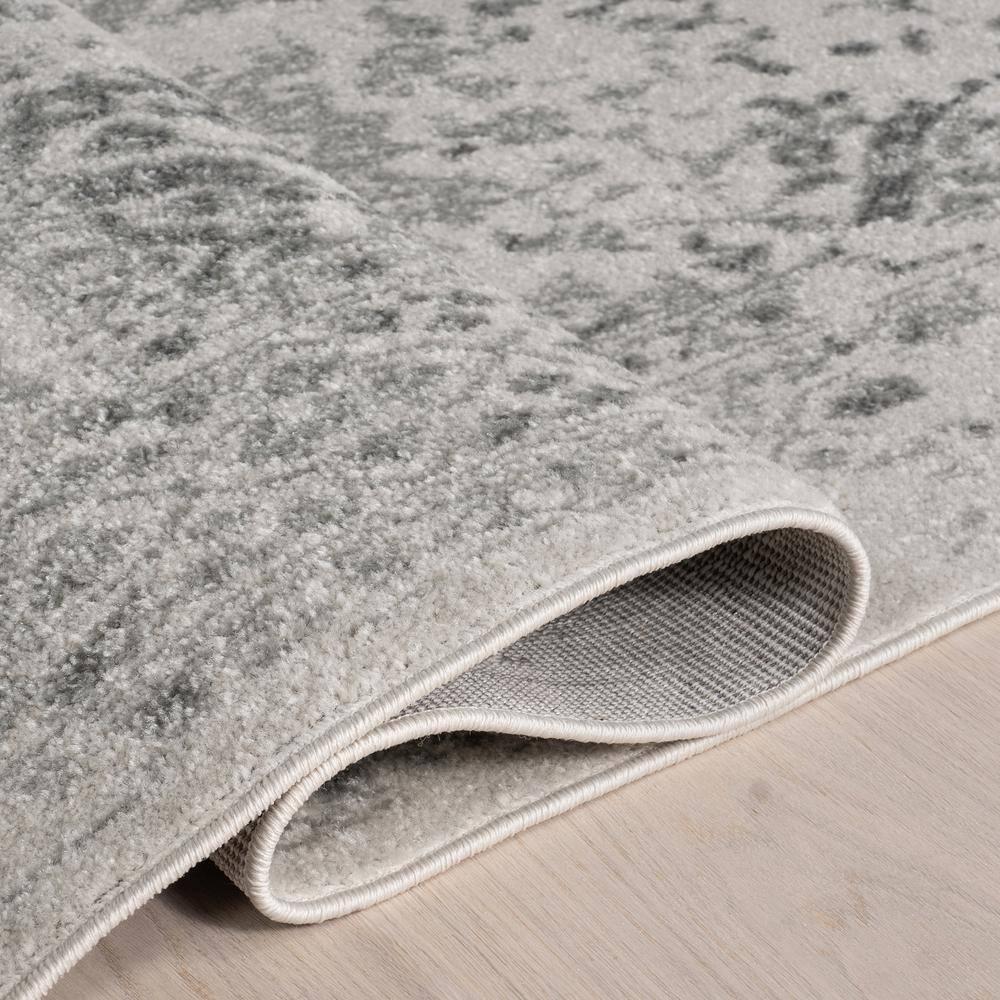 nuLOOM Odell Faded Vintage Ivory 6' 7" x 9' Vintage Area Rug