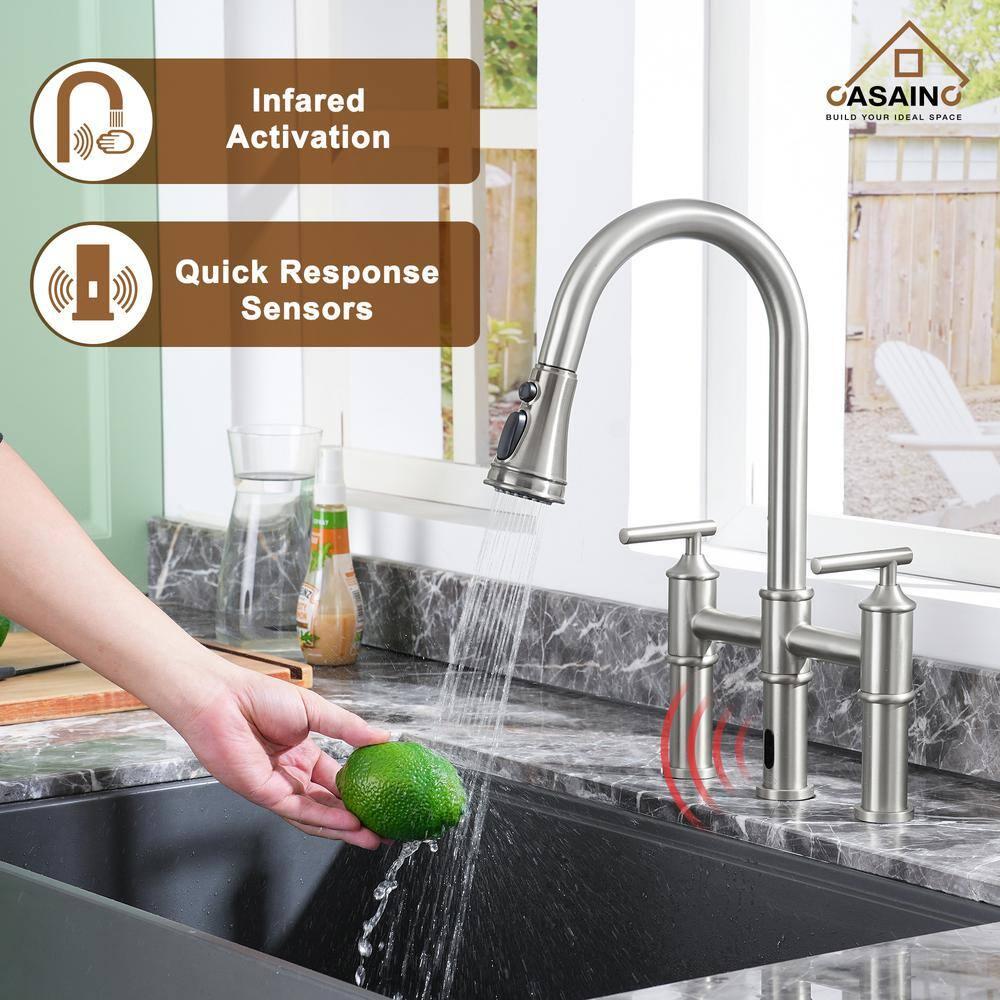 Double Handle Pull-Out Sprayer Bridge Kitchen Faucet with Infrared Sensor in Brushed Nickel
