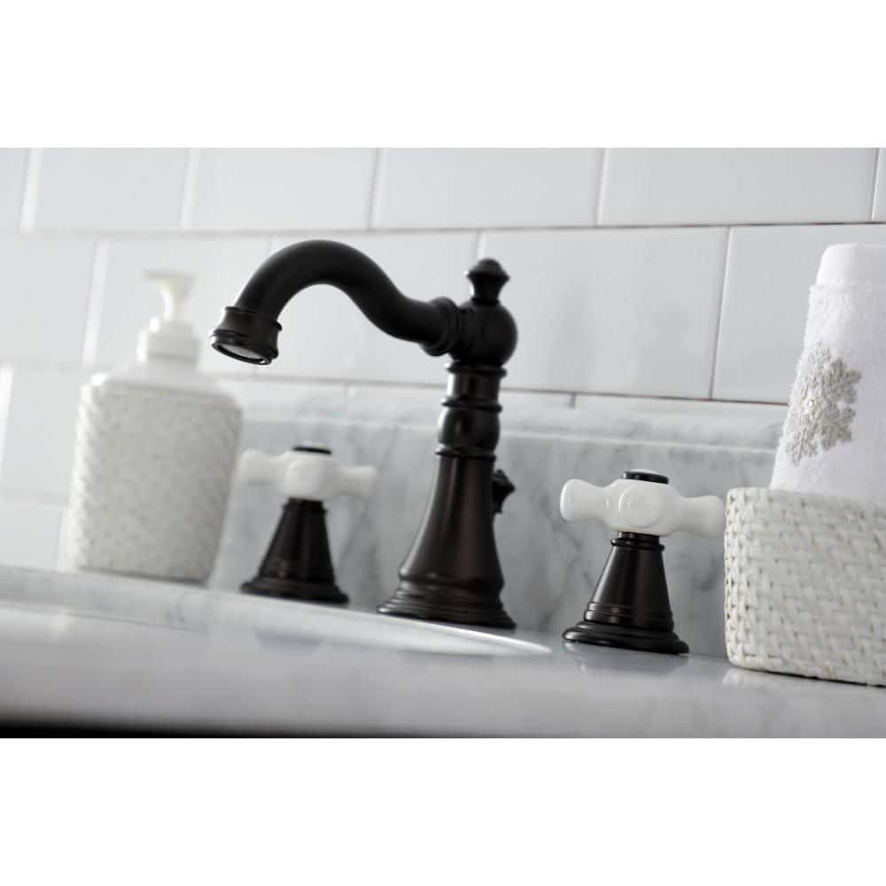 Kingston Brass American Classic Two-Handle 3-Hole Deck Mount Widespread Bathroom Faucet with Pop-Up Drain