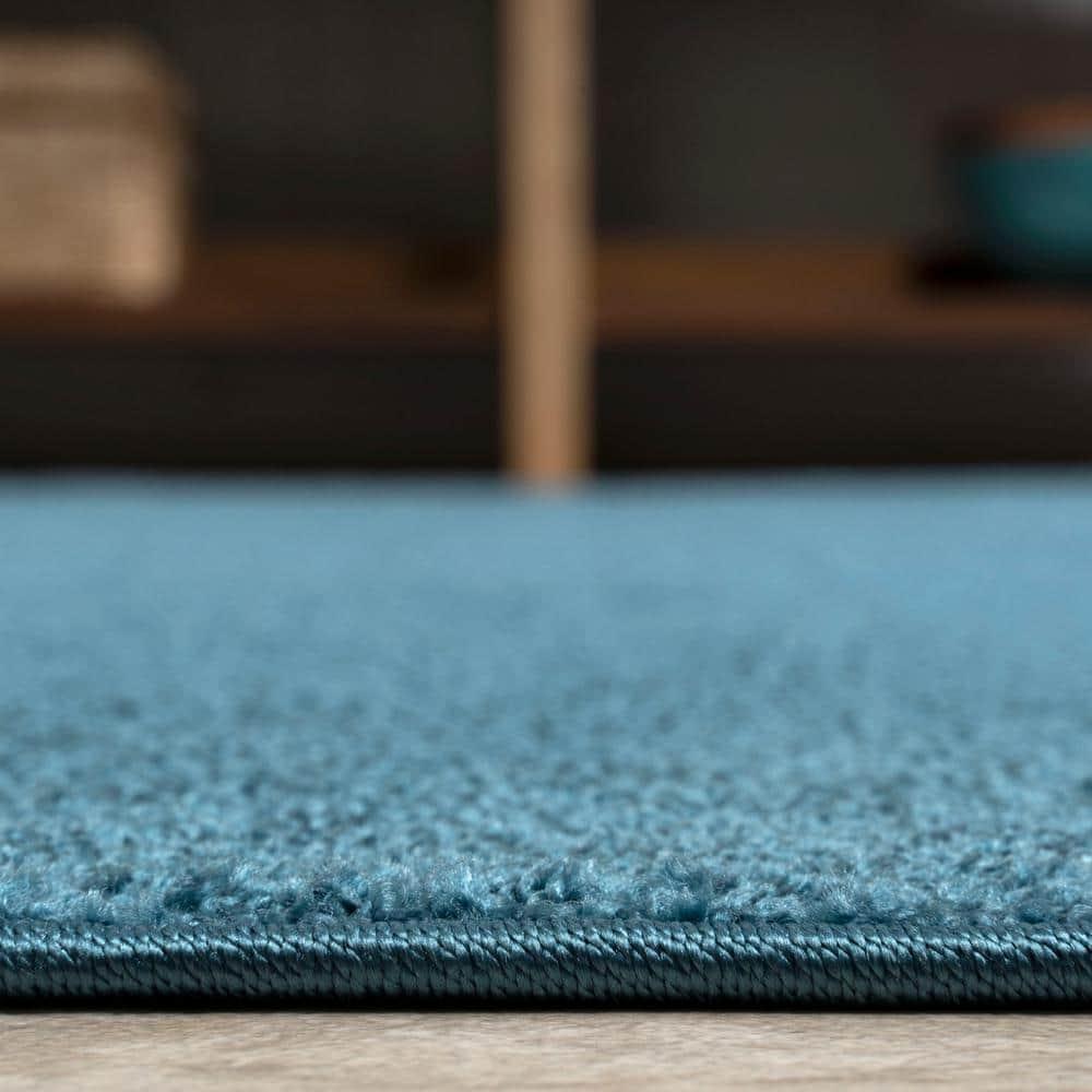 8'x10' Haze Solid Low-Pile Area Rug, Turquoise - JONATHAN Y