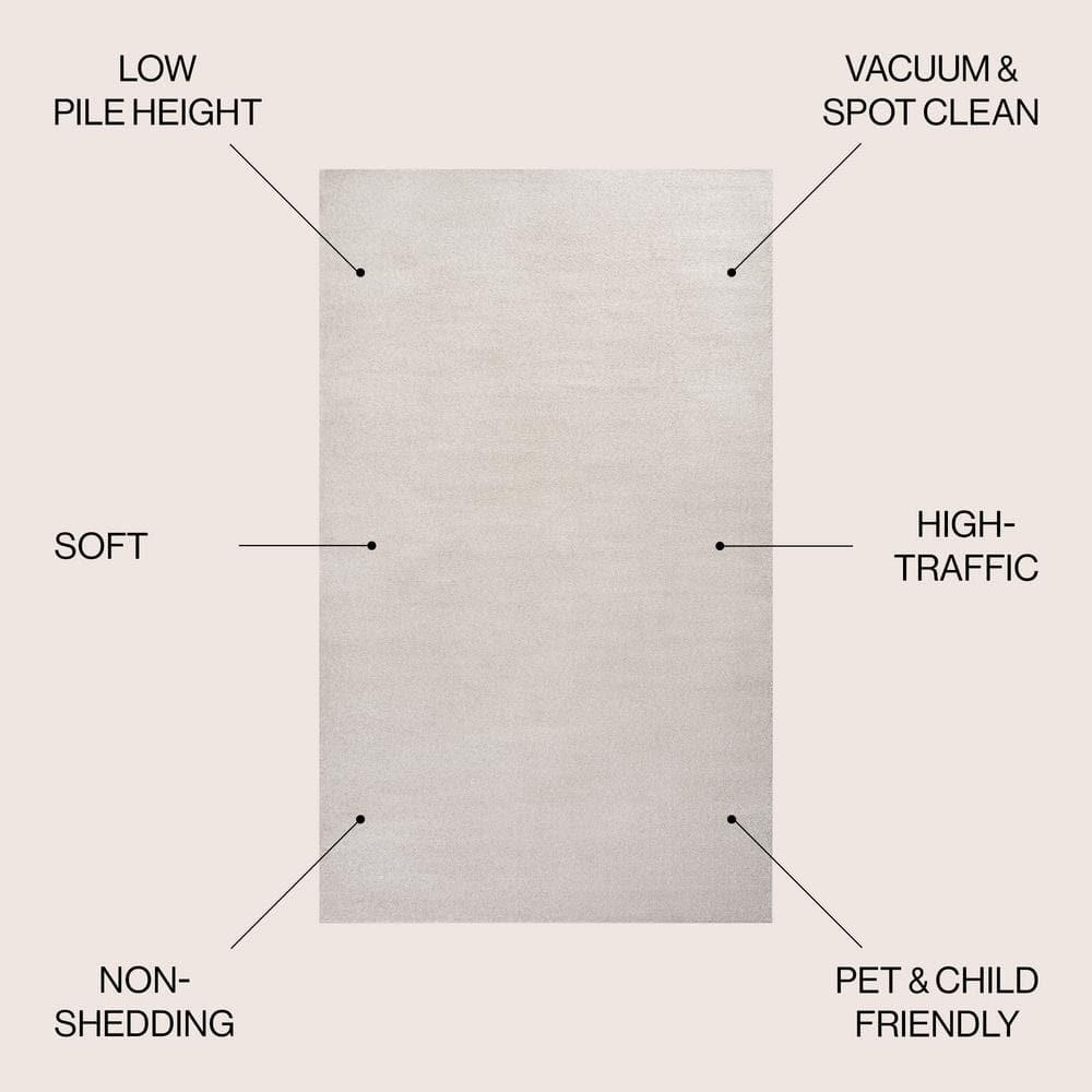 8'x10' Haze Solid Low-Pile Area Rug, Ivory - JONATHAN Y