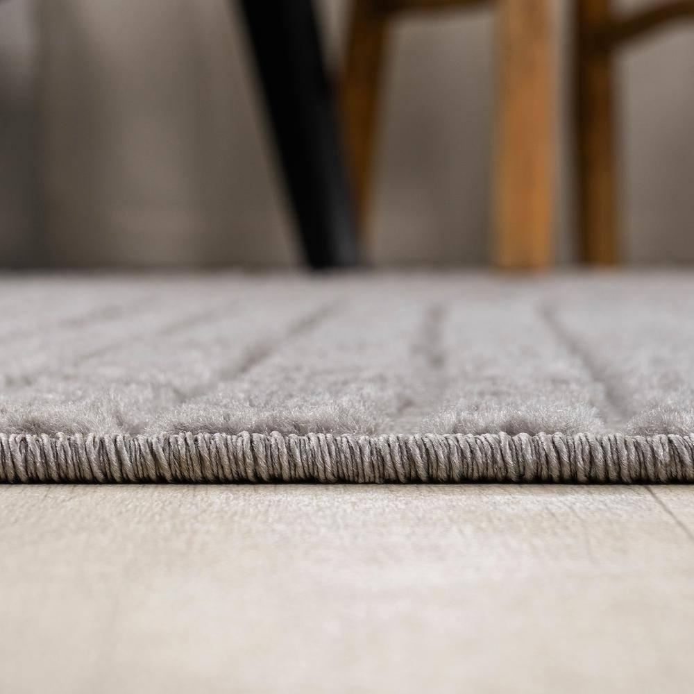 JONATHAN Y Skagen High-Low Minimalist Curve Geometric Gray/Ivory 4 ft. x 6 ft. Indoor/Outdoor Area Rug