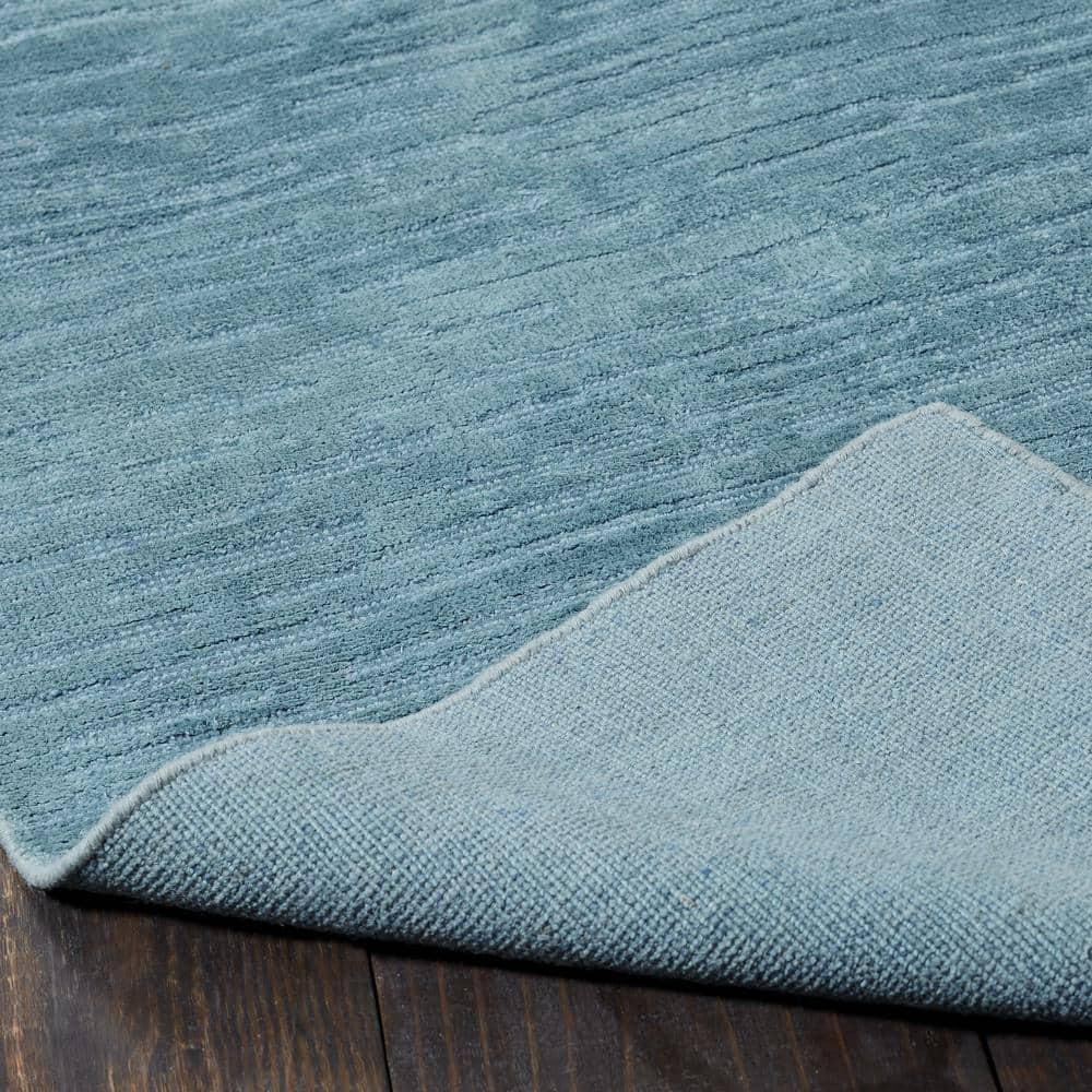 Kozeroff Blue Area Rug