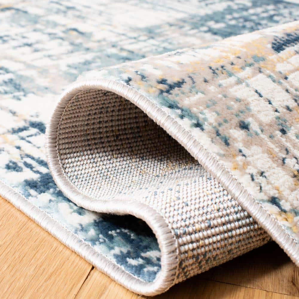 SAFAVIEH Skyler Mandy Distressed Area Rug, Navy/Gold, 8' x 10'