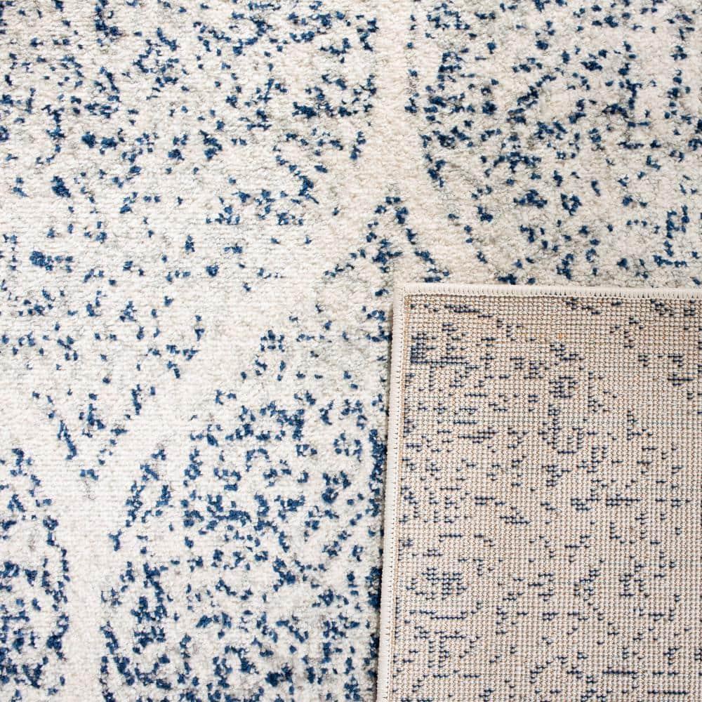 SAFAVIEH Madison Leighton Geometric Area Rug, Cream/Royal Blue, 10' x 14'