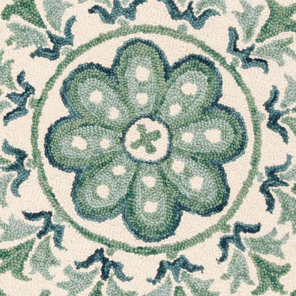 Novelty NOV607 Hand Tufted Area Rug - Ivory/Teal - 5' round - Safavieh.