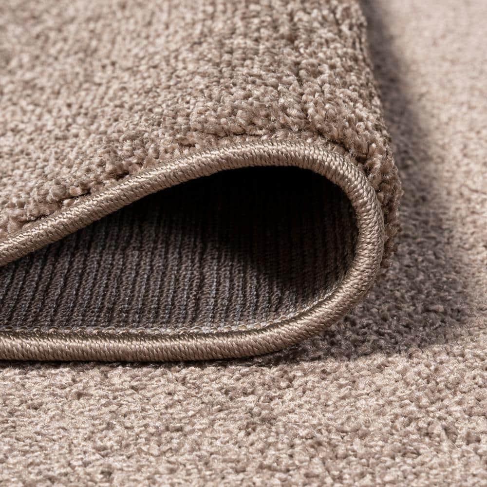 5'x8' Haze Solid Low-Pile Area Rug, Brown - JONATHAN Y