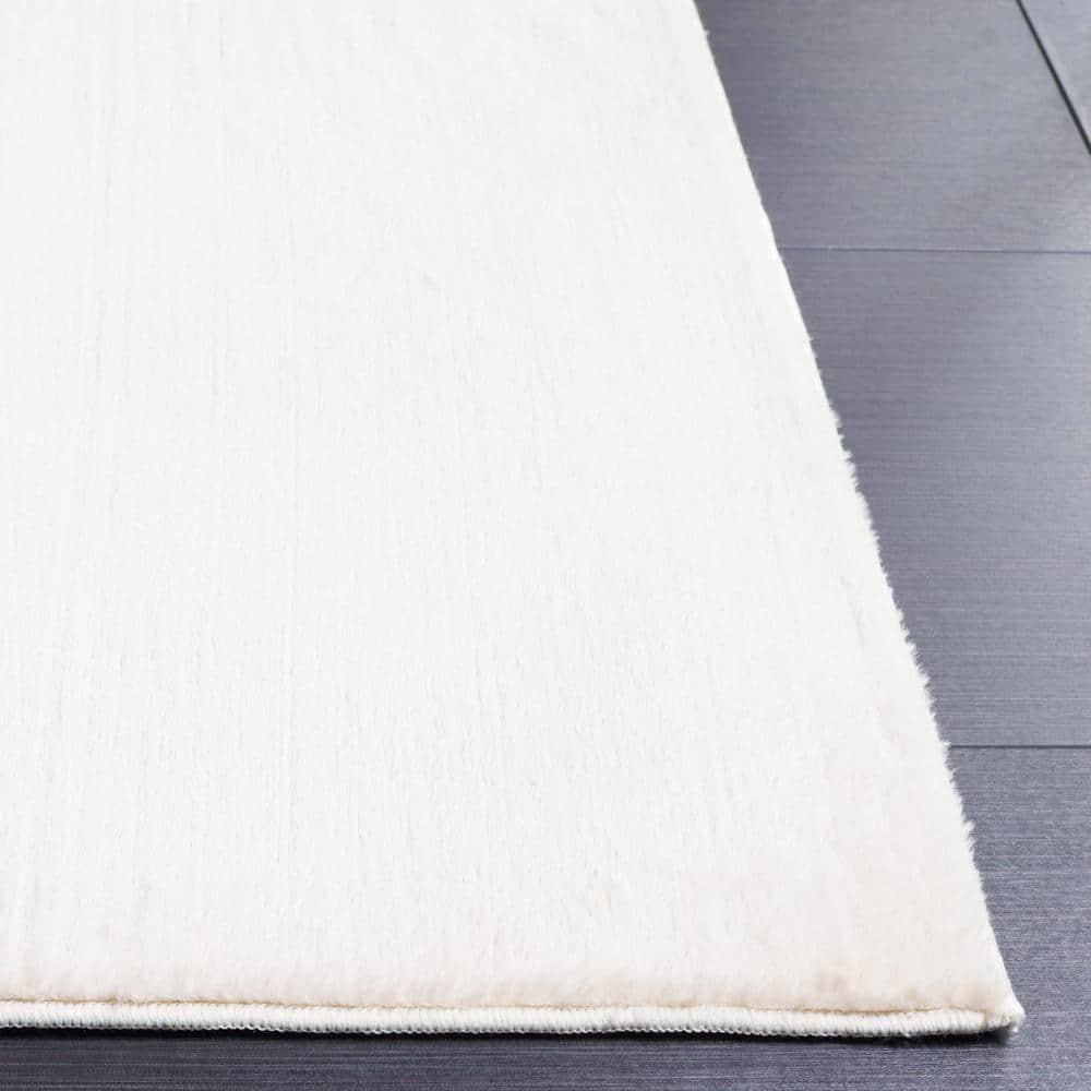 SAFAVIEH Faux Rabbit Fur Daven Solid Area Rug, Beige, 6' x 9'
